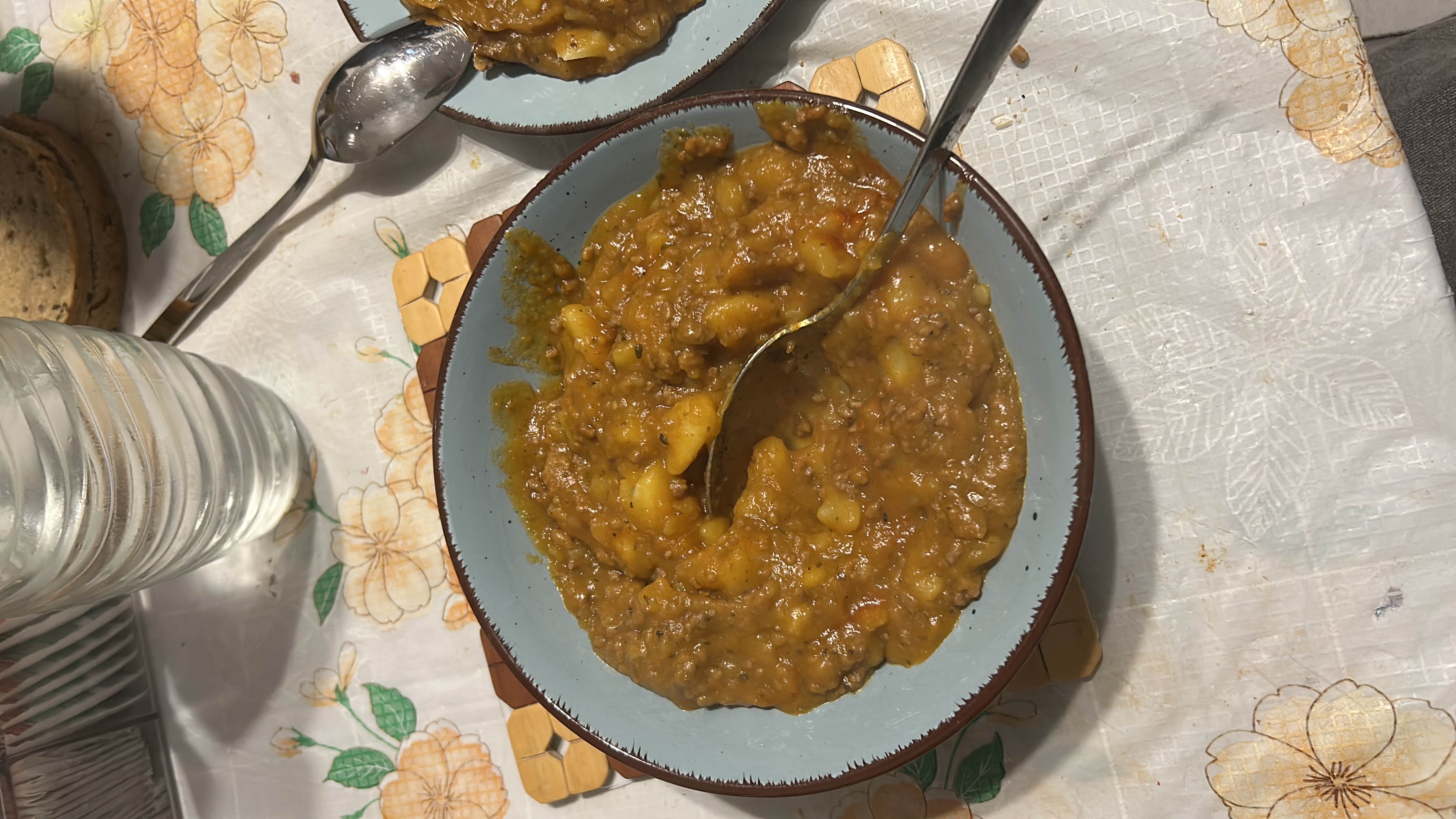 A hearty dish consisting of potatoes, ground meat, and tomato sauce, providing a balanced mix of protein, carbs, and fats.