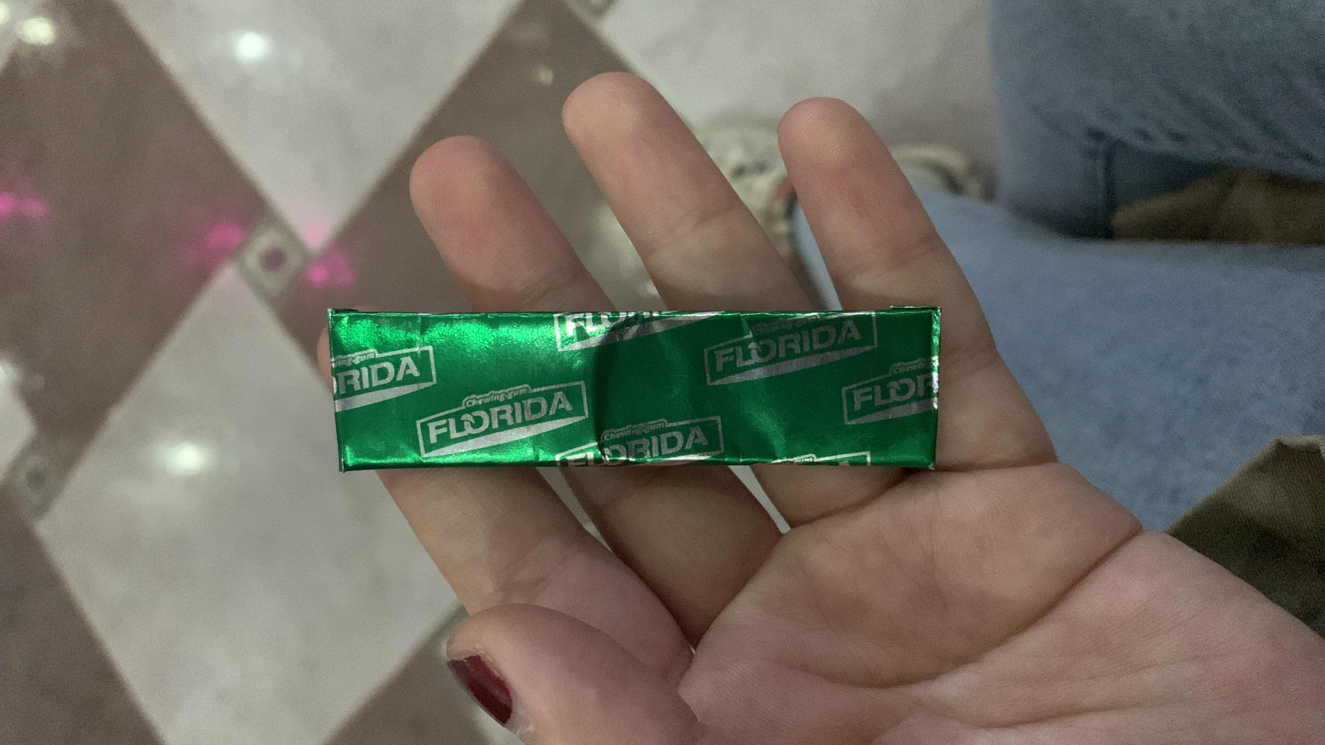 A single piece of sugar-free chewing gum with minimal calories and no significant macronutrients.