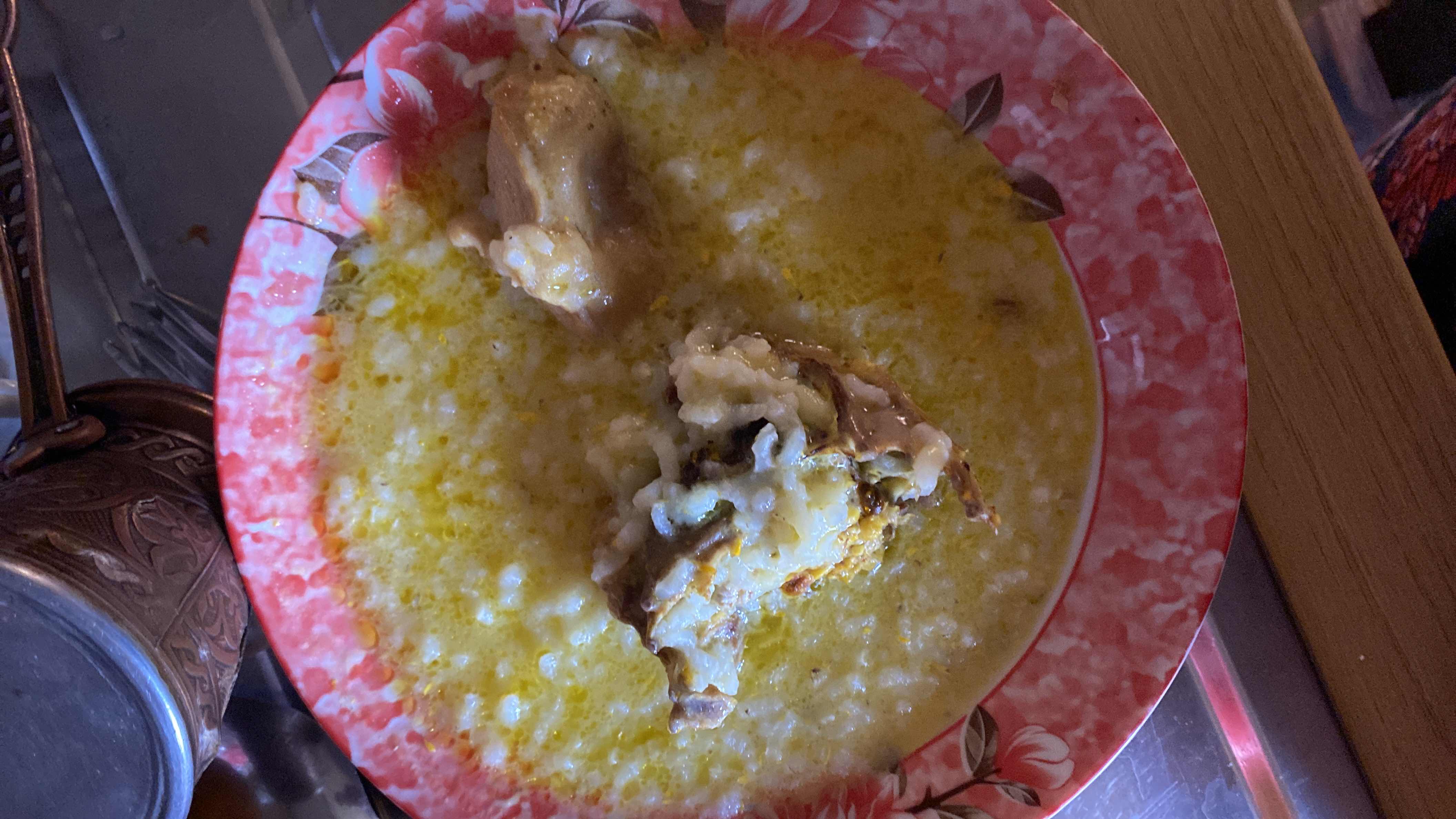 A hearty dish consisting of chicken, rice, and butter, providing a balanced mix of protein, carbs, and fats.