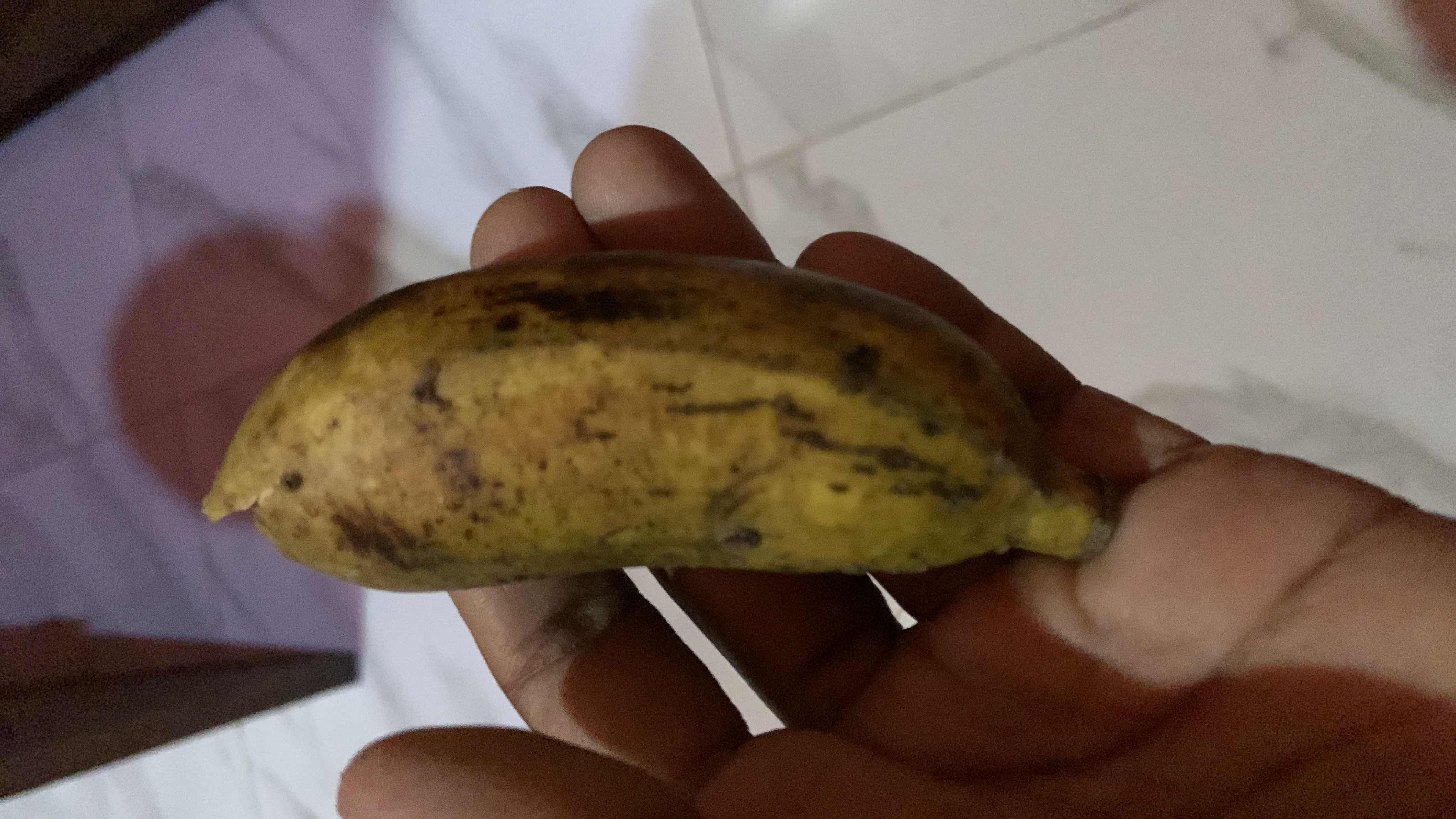 The image shows a ripe banana, which is a nutritious fruit rich in carbohydrates and low in fats.