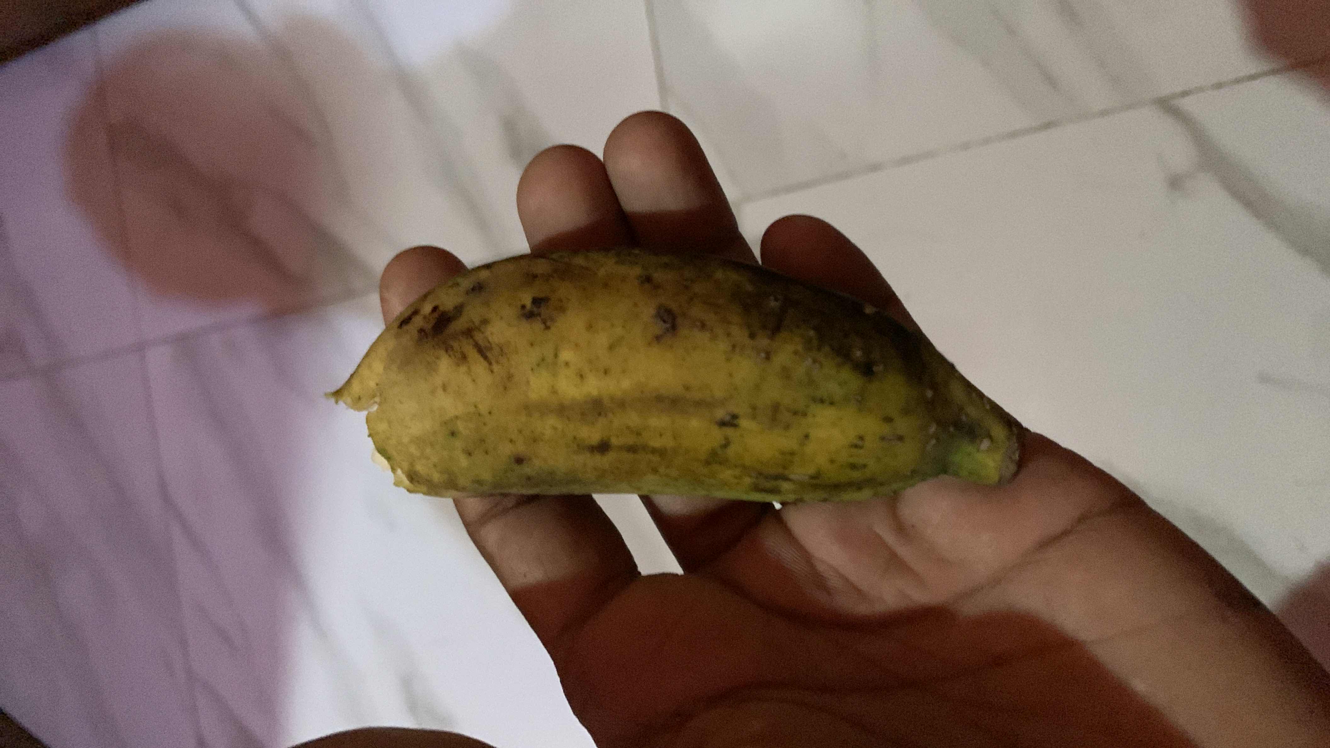 The image shows a ripe banana, which is a nutritious fruit rich in carbohydrates and low in fats.