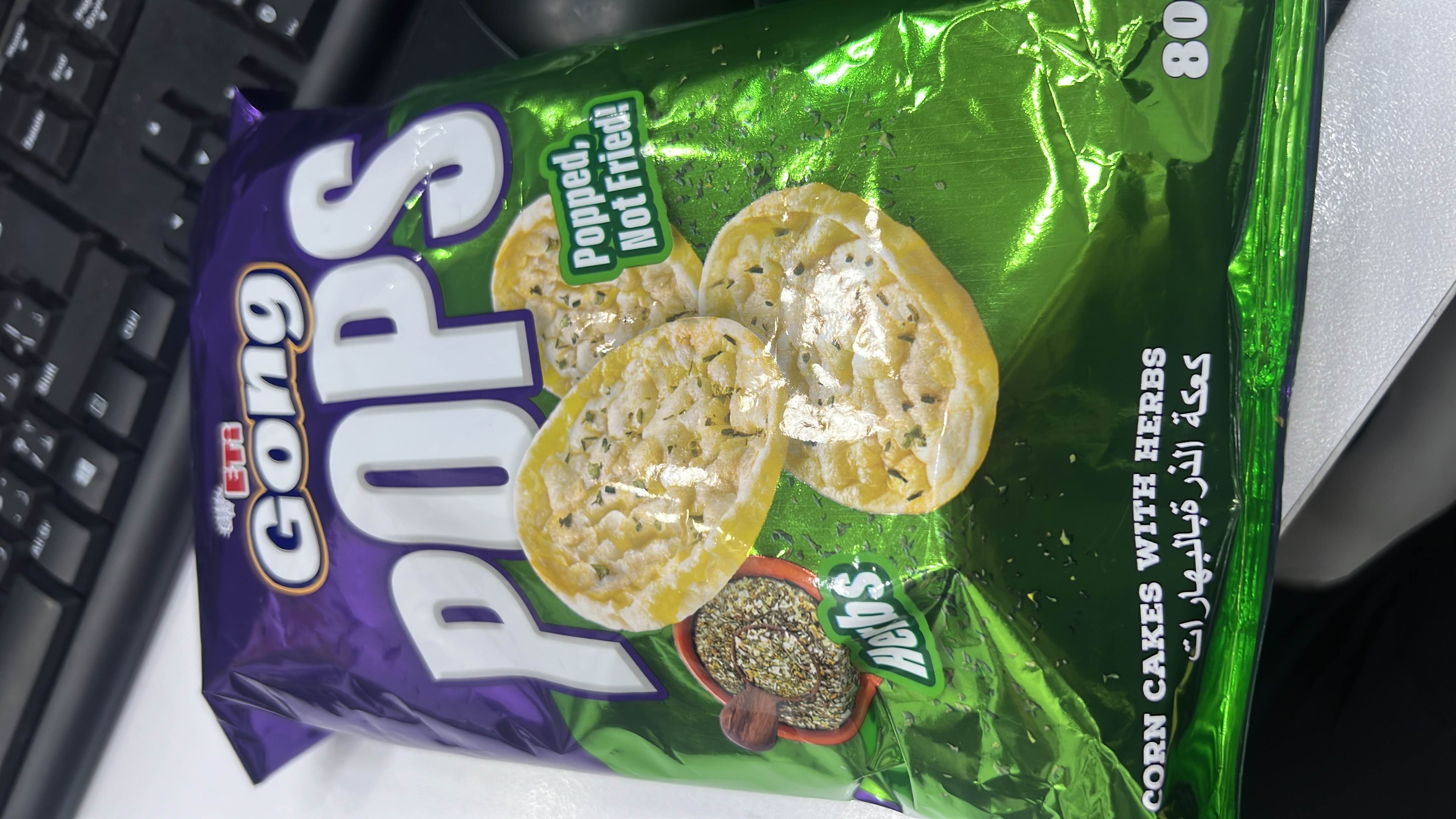 Corn cakes with herbs, popped and not fried, offering a low-calorie snack option.