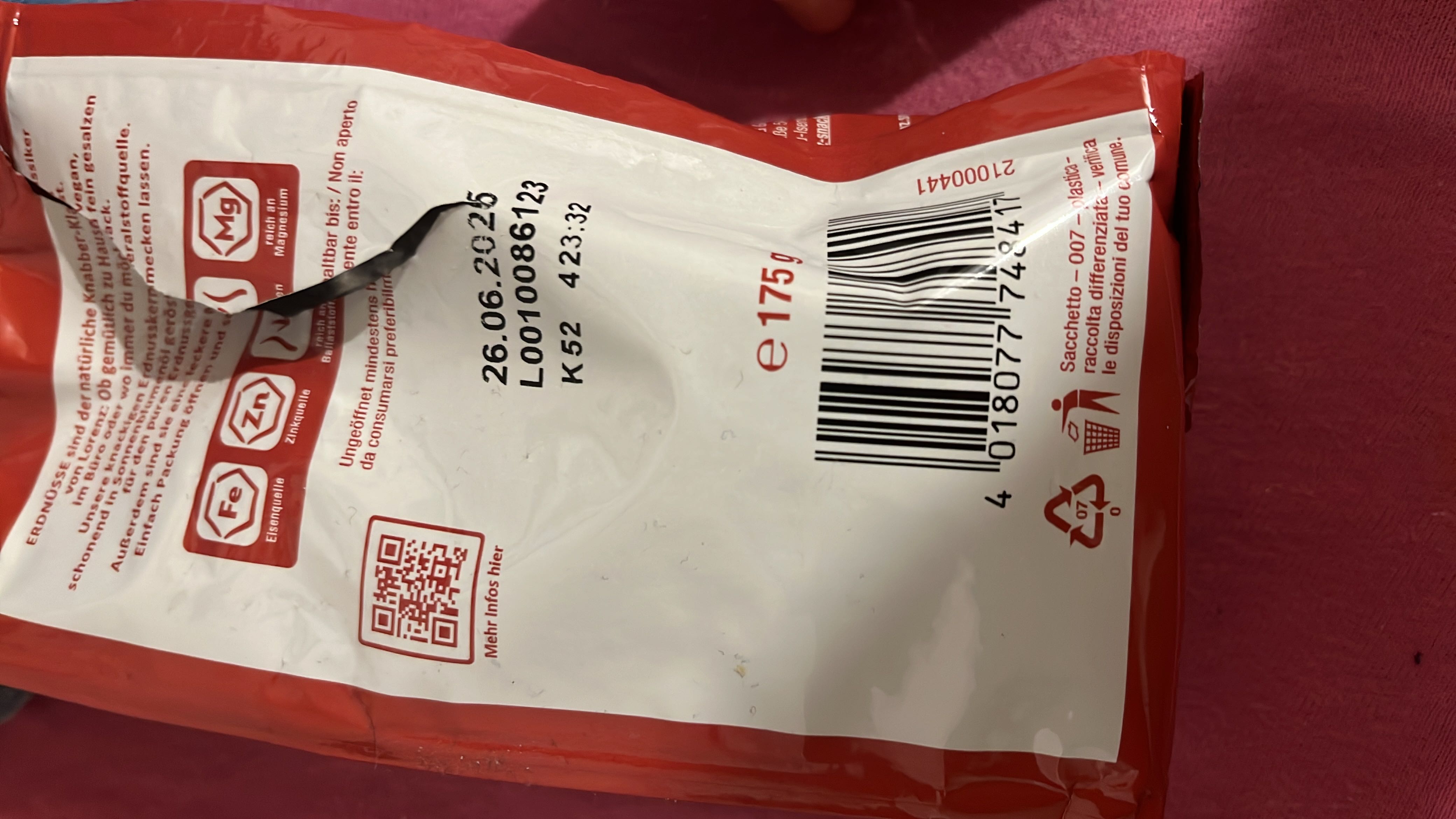 The image shows packaging for peanuts, highlighting their nutritional benefits such as being a source of iron, zinc, and magnesium.