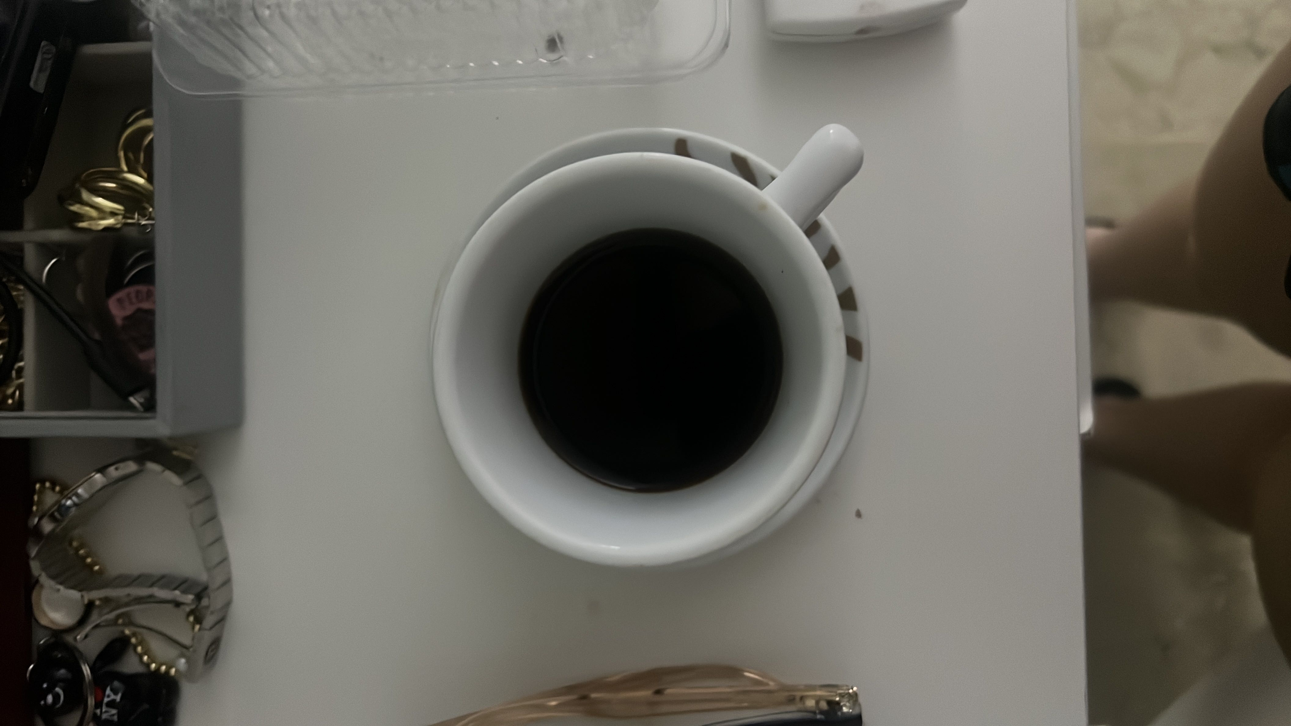 A cup of black coffee with one and a half tablespoons of sugar, containing 76 calories with 0g fat, 0g protein, and 20g carbs.