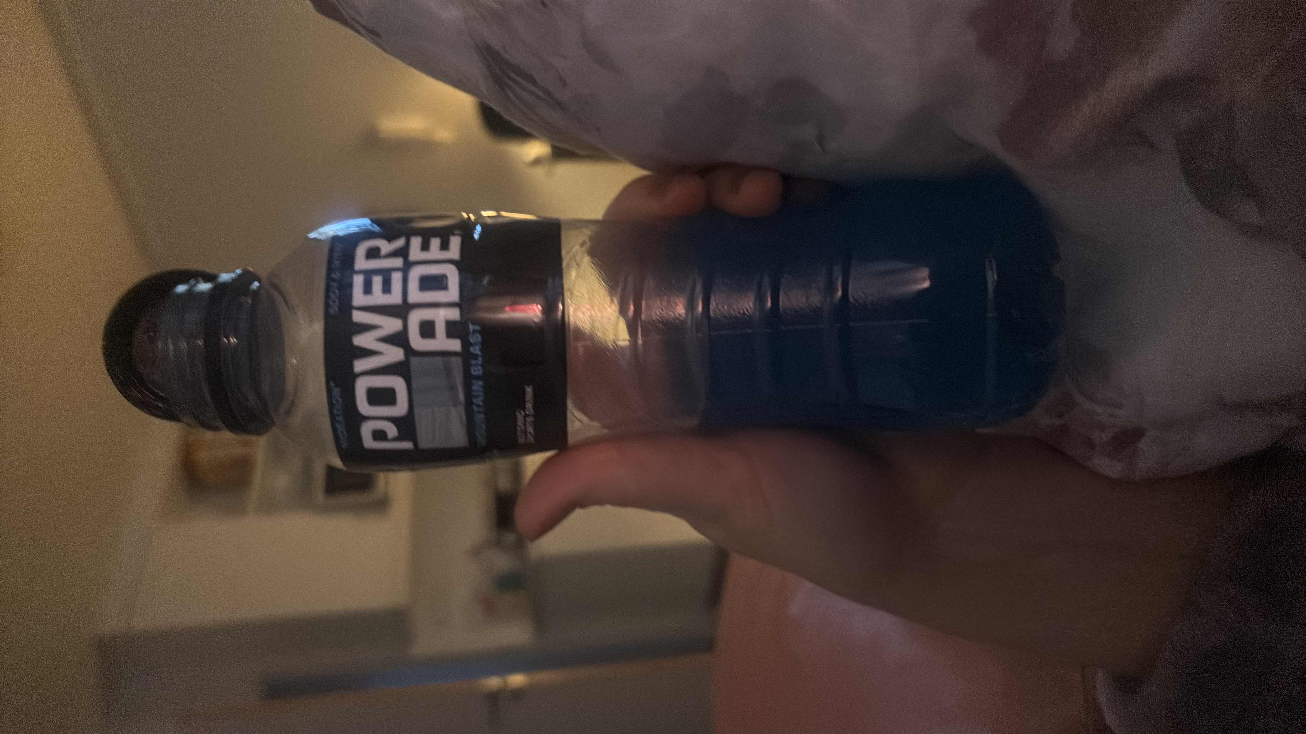 Powerade Mountain Blast is a sports drink containing 80 calories per serving, primarily from carbohydrates, with added electrolytes for hydration.