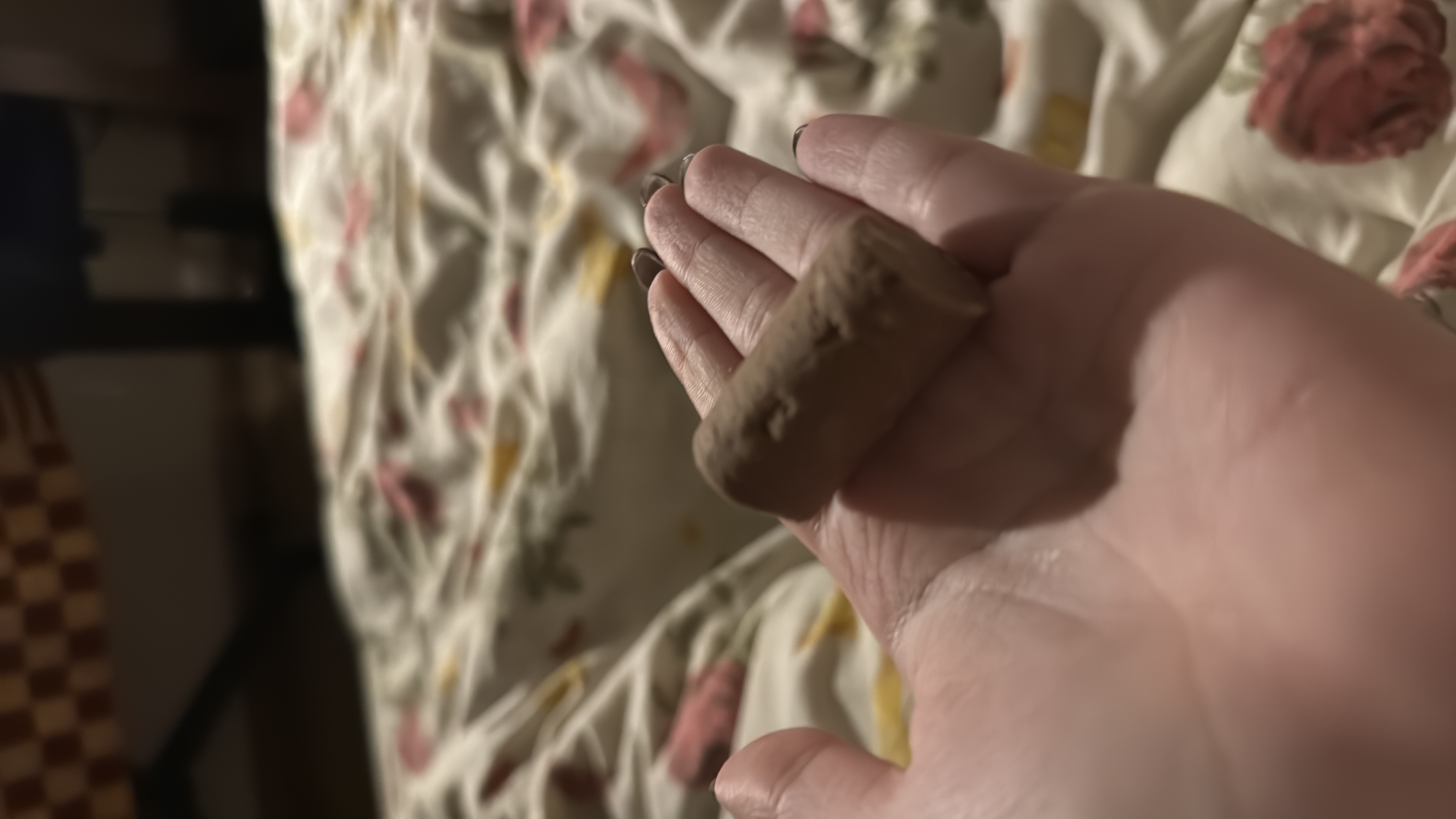A small chocolate truffle, likely containing a mix of cocoa, sugar, and cream, providing a moderate calorie count.