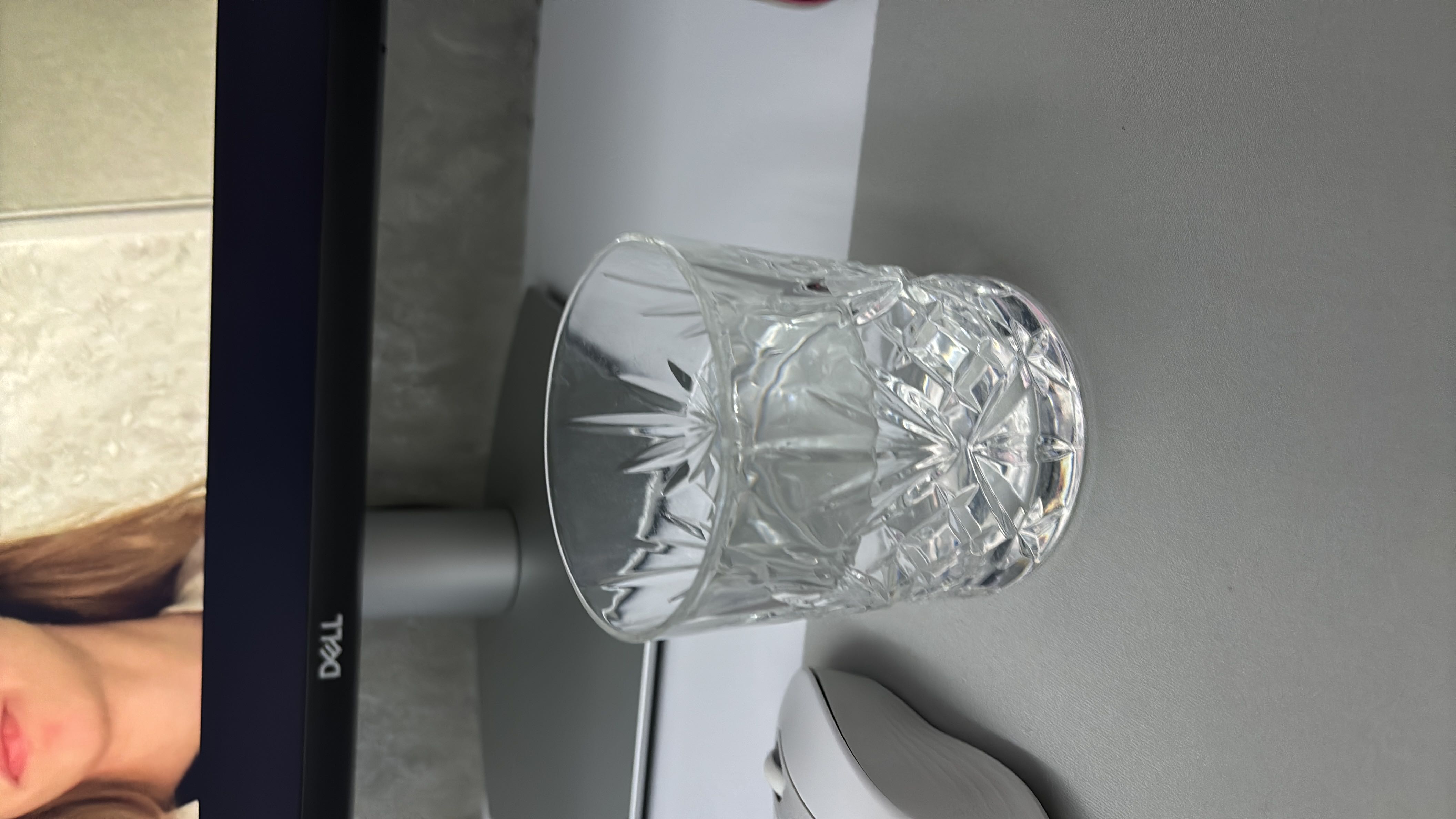 The image shows a glass of water, which contains no calories, protein, carbs, or fats, making it a healthy and hydrating choice.