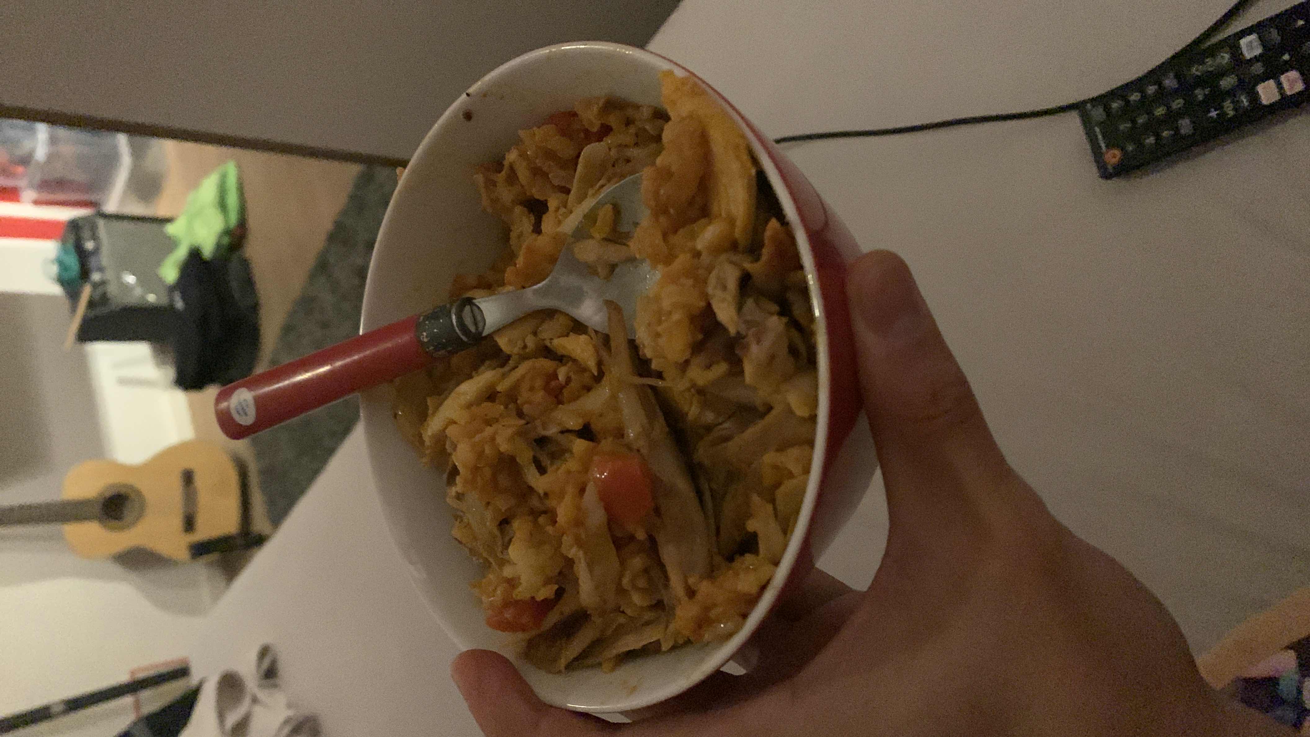 A bowl of chicken, rice, and vegetables, providing a balanced mix of protein, carbs, and fats.