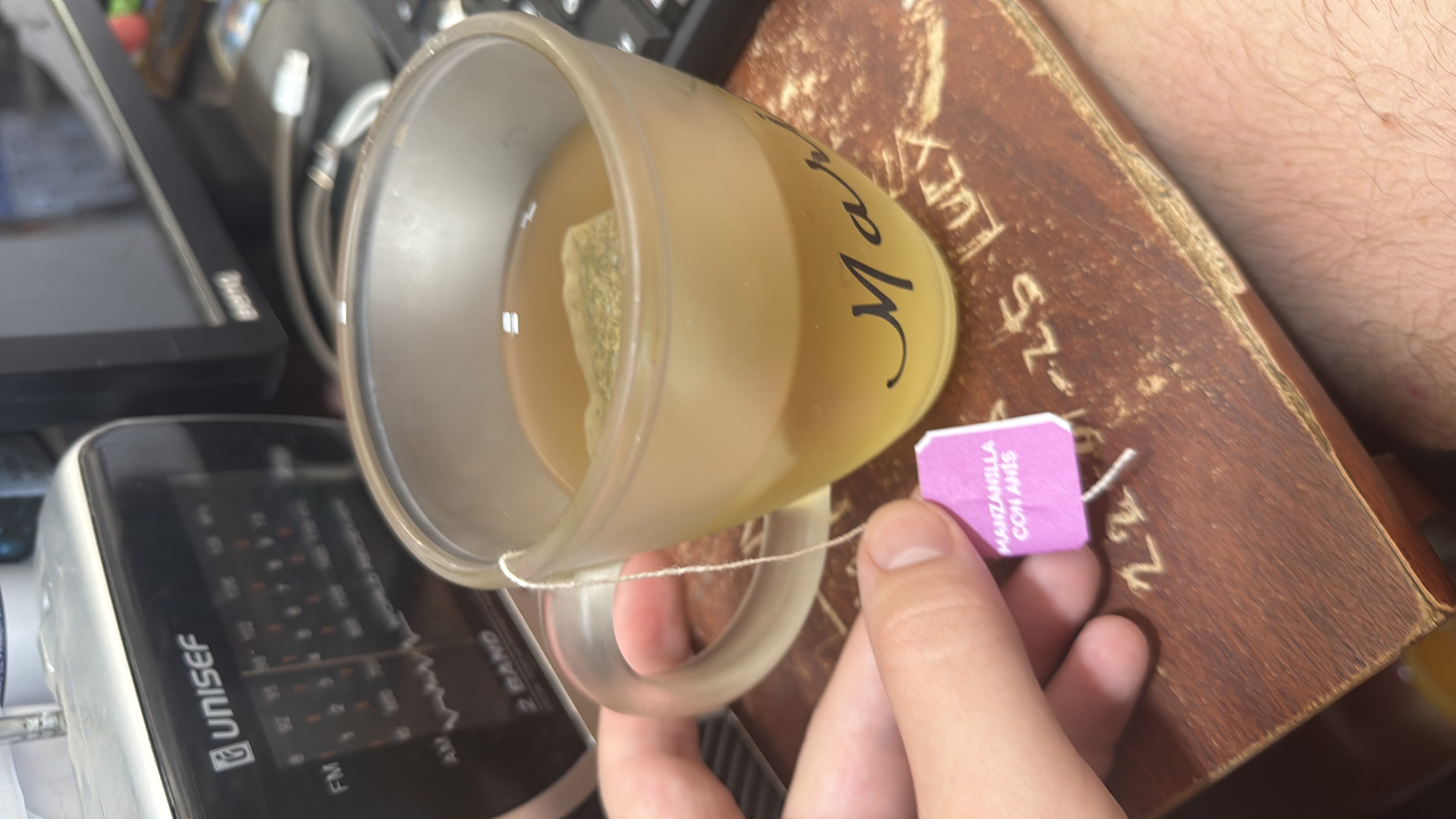 A cup of chamomile tea with anise, a low-calorie herbal beverage with calming properties.