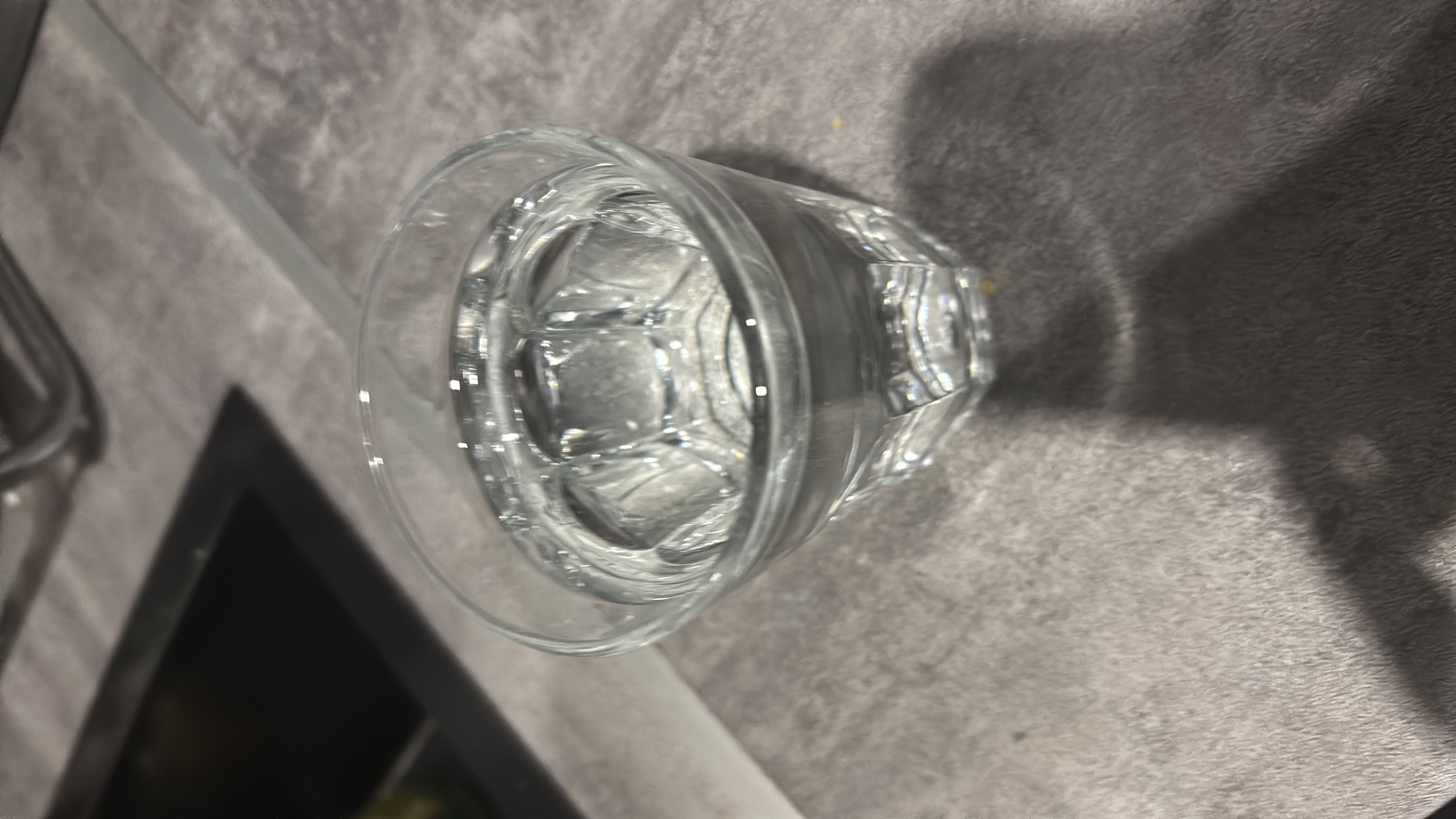 A glass of water, which is calorie-free and essential for hydration.