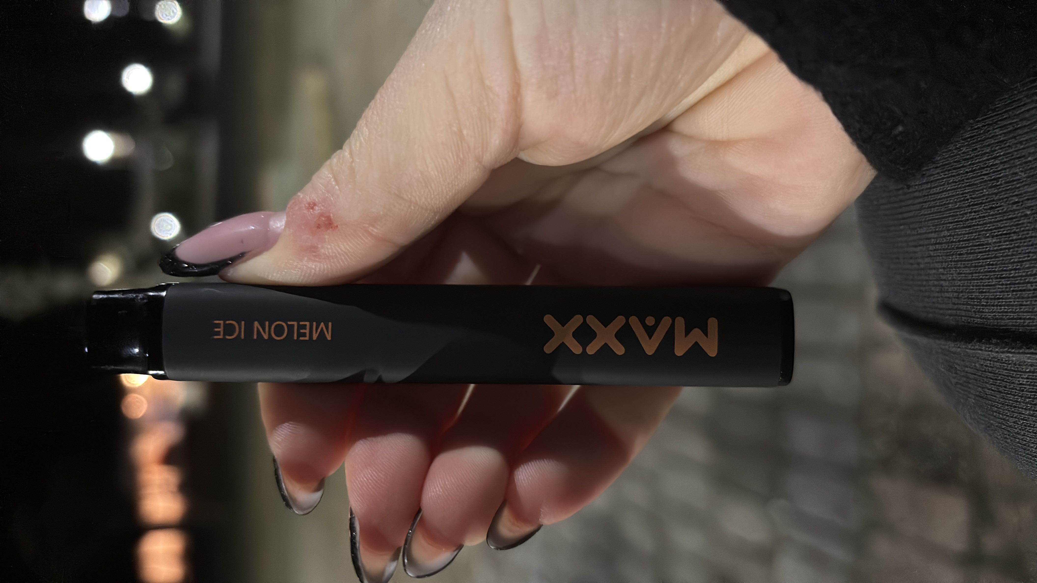 The image depicts a vaping device labeled 'Melon Ice,' which does not contain nutritional information as it is not a consumable food or beverage product.