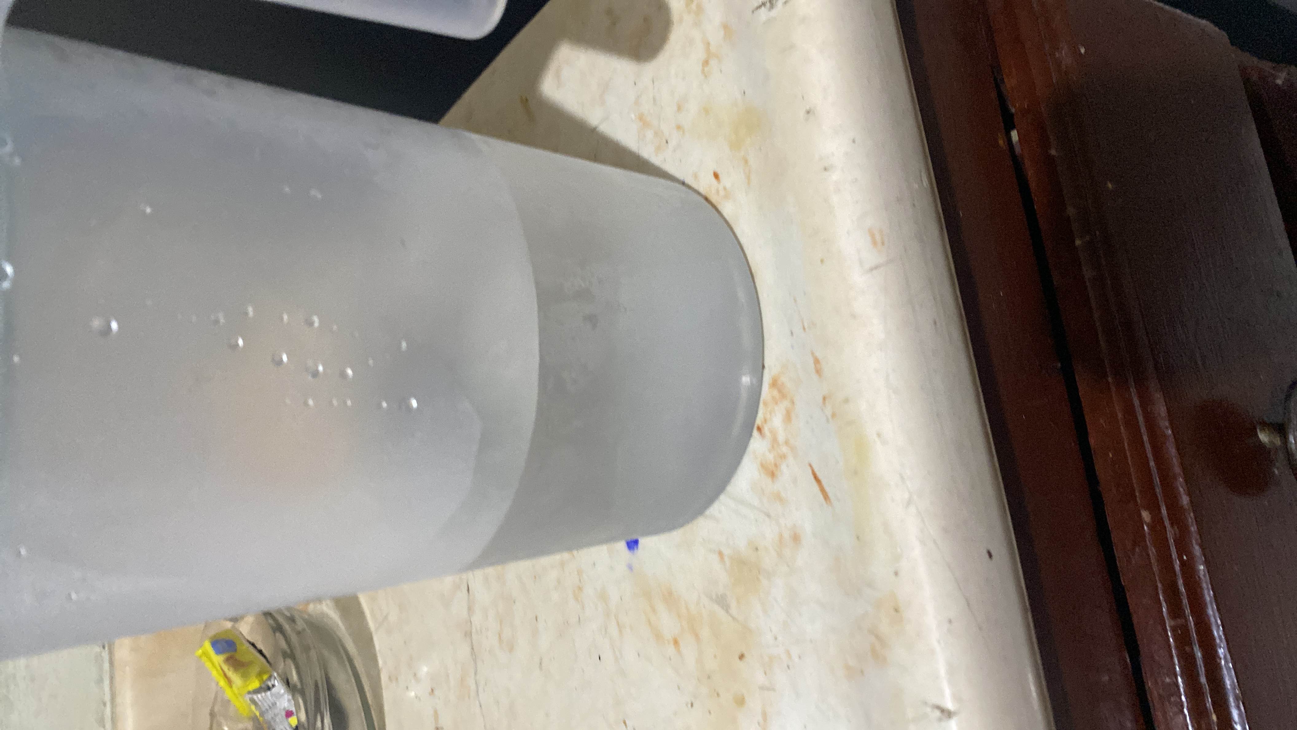 The image shows a glass of water, which contains no calories, protein, carbs, or fats. It is a healthy and hydrating beverage.