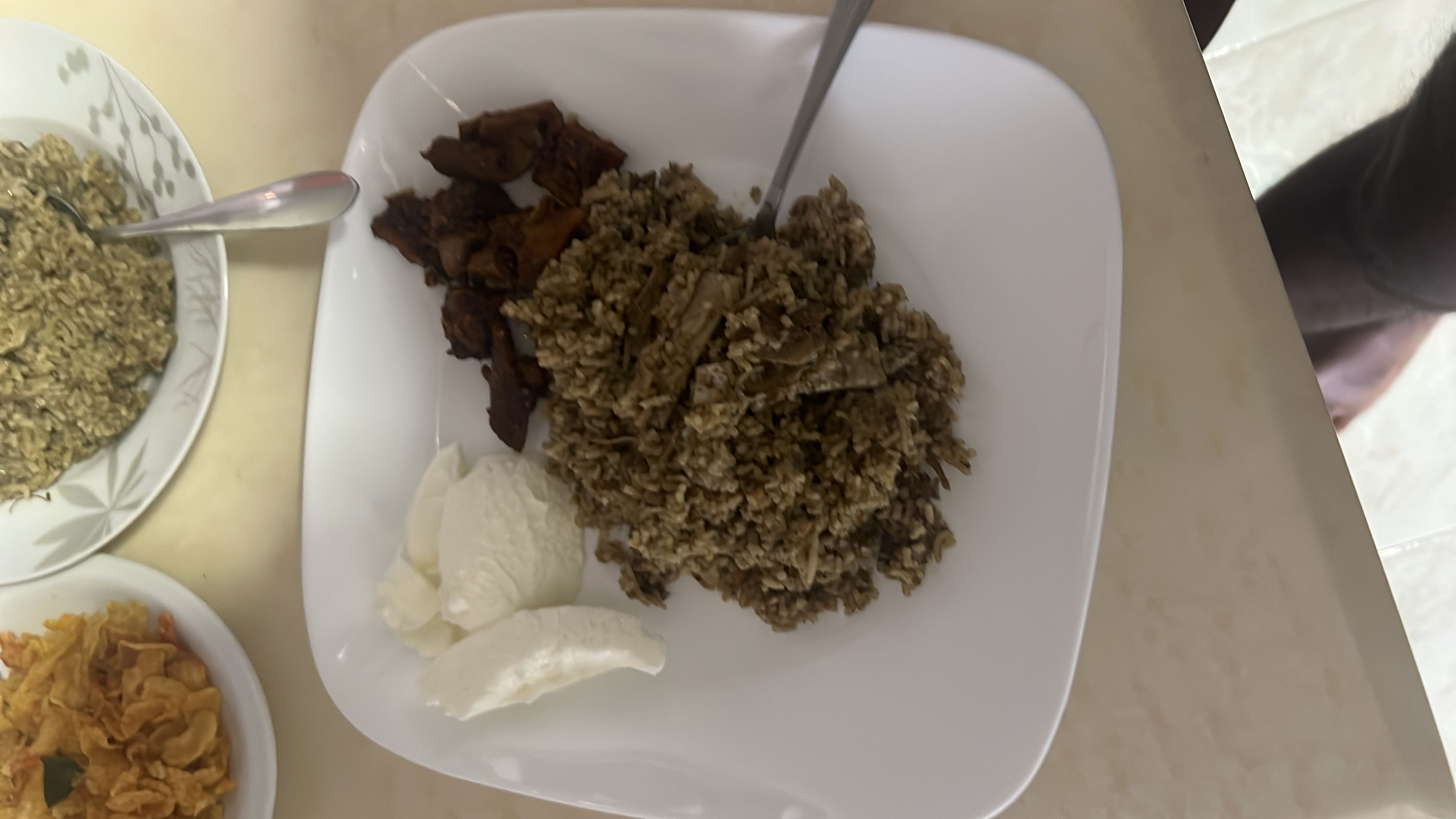 A flavorful dish of spiced mutton, providing a balance of protein, carbohydrates, and fats.