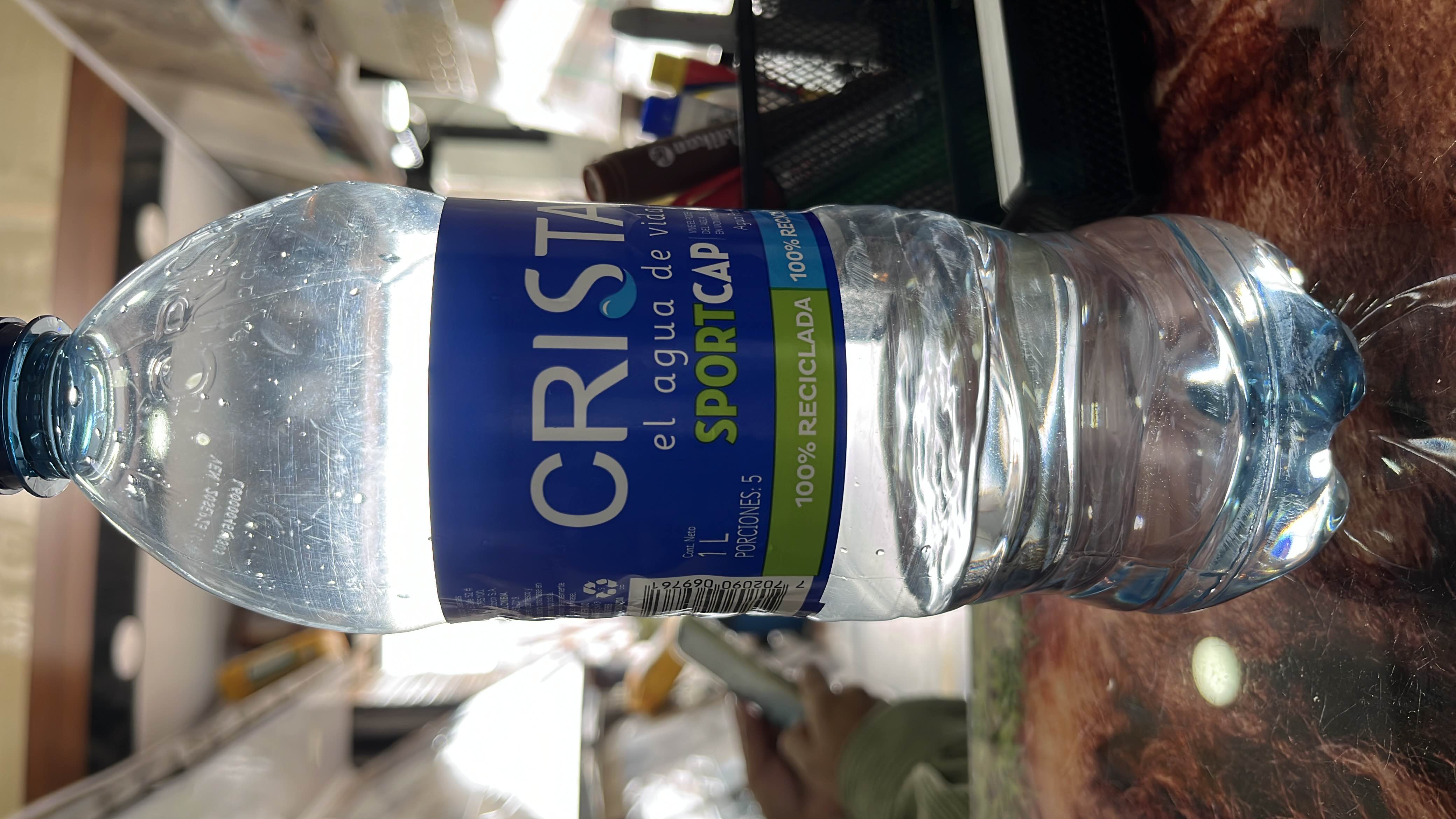 This is a 1-liter bottle of Cristal water with no calories, fats, proteins, or carbohydrates. It is a healthy hydration option.