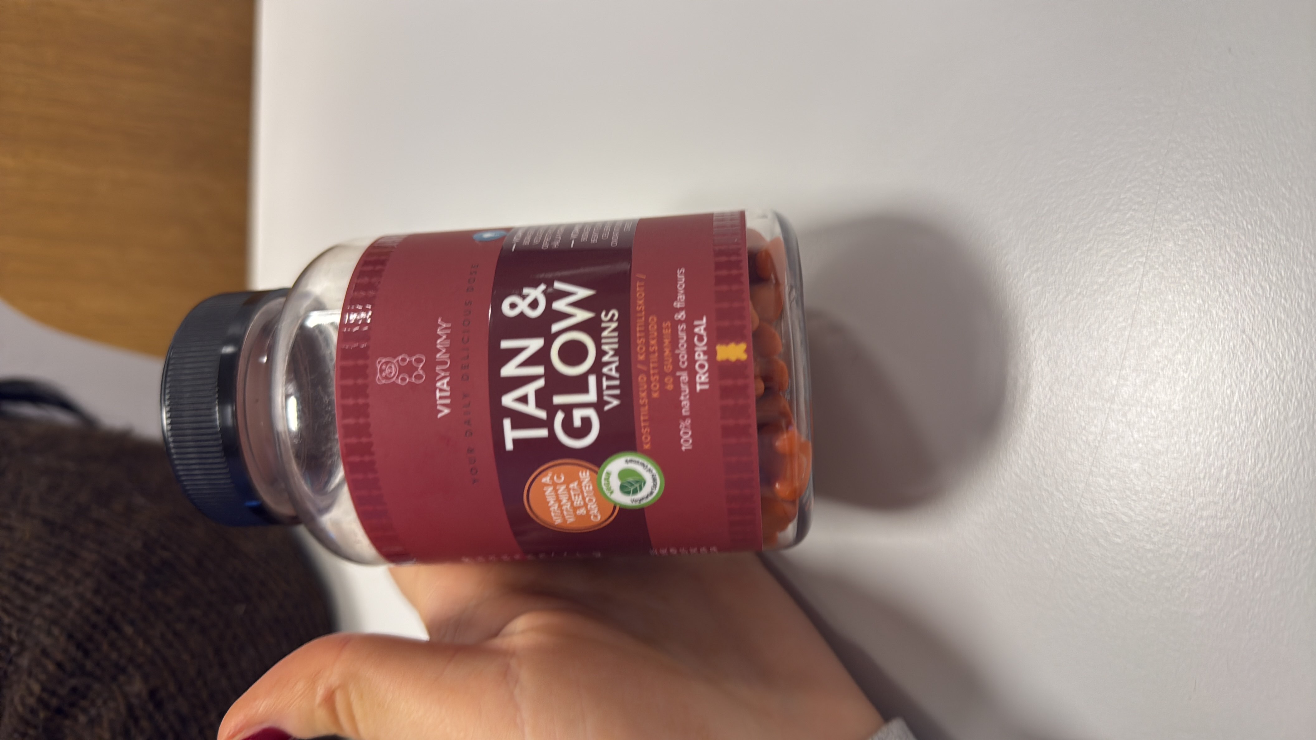 VitaYummy Tan & Glow Vitamins are tropical-flavored gummies fortified with Vitamin A, Vitamin C, and Beta Carotene, designed to support skin health and provide essential nutrients.