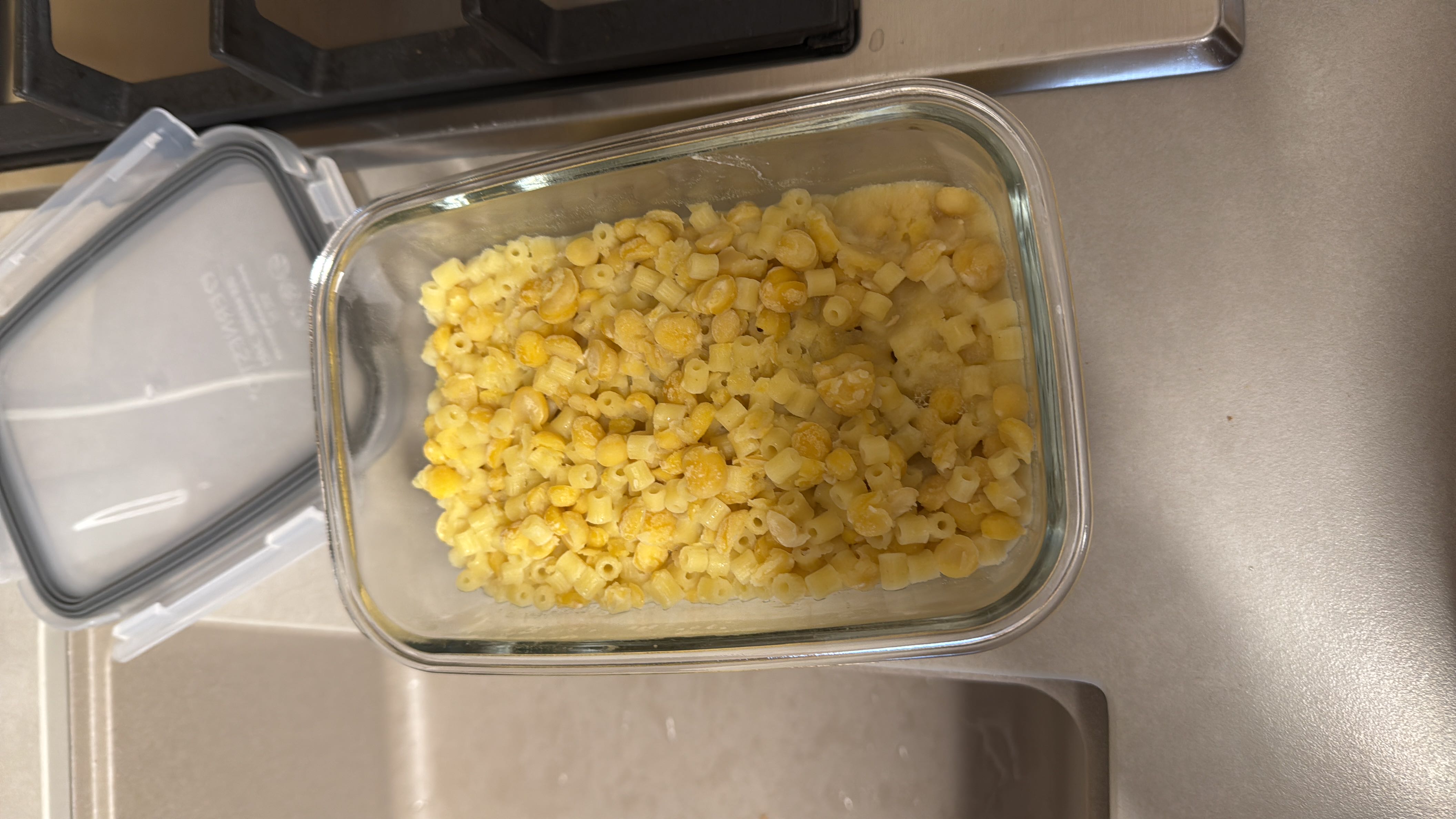 A dish consisting of small pasta and chickpeas, likely prepared with a light sauce or seasoning.