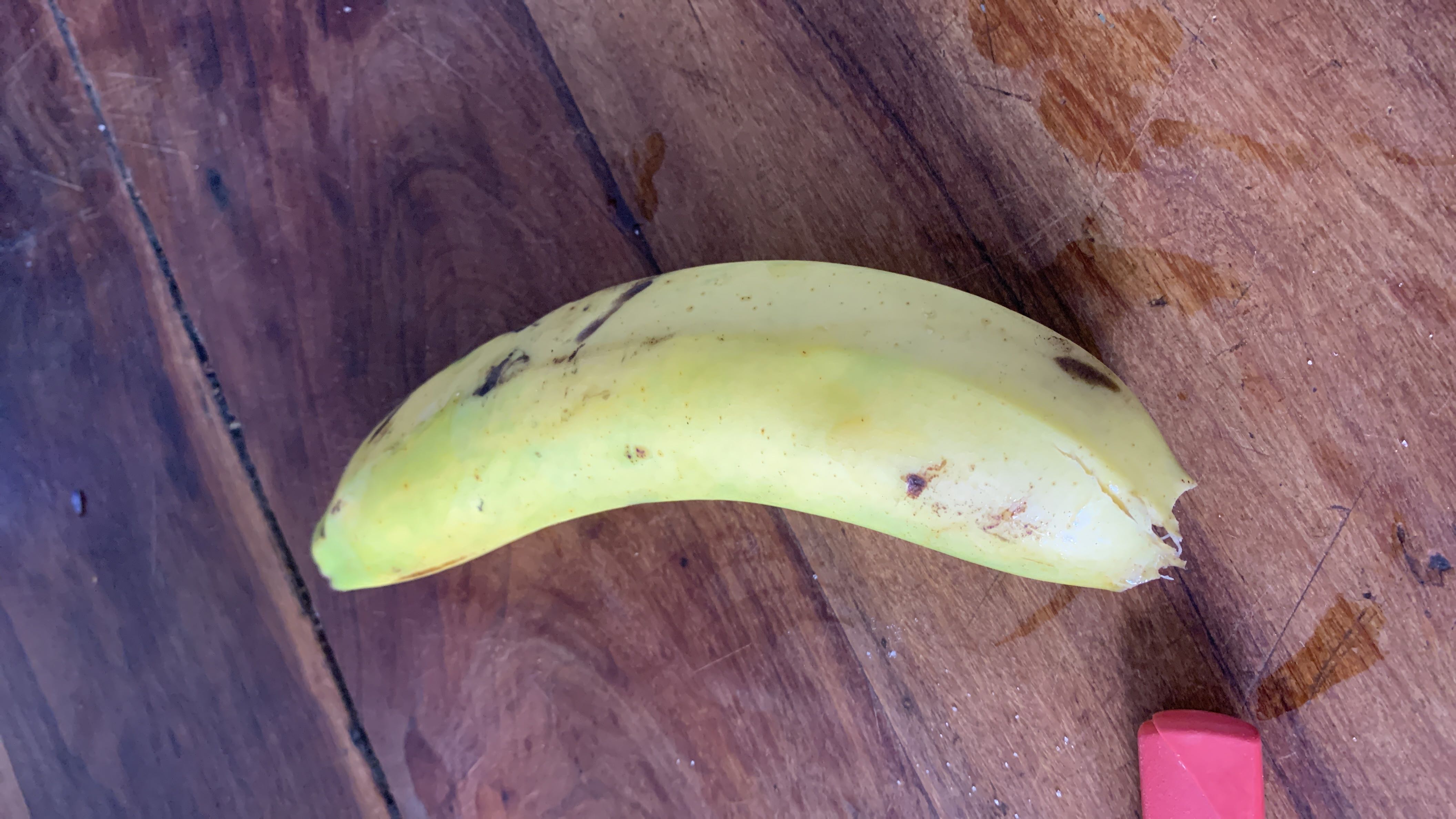 A ripe banana, rich in carbohydrates and essential nutrients, providing a quick energy boost.