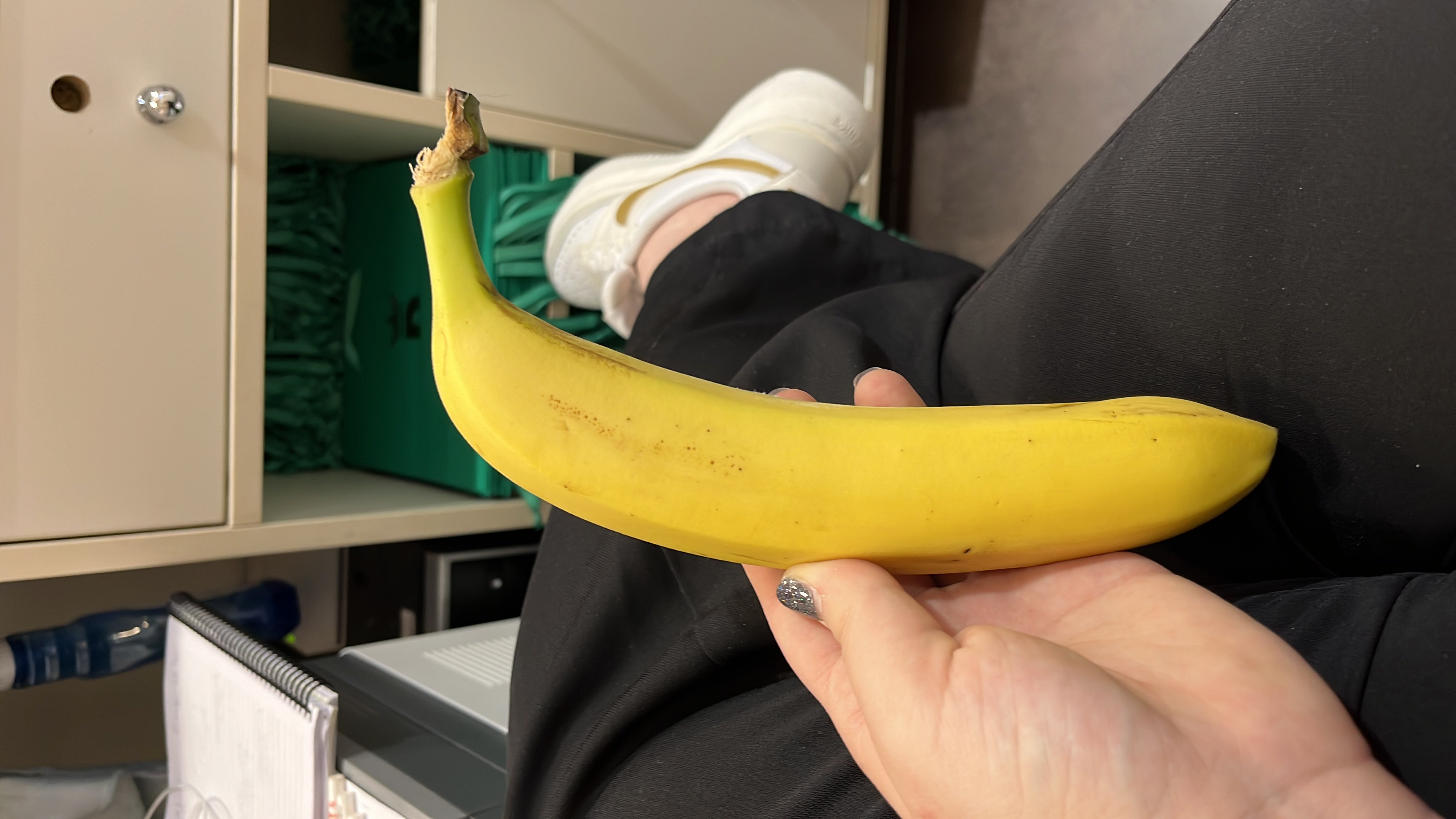 A ripe banana, rich in carbohydrates and essential nutrients, providing a quick energy boost.