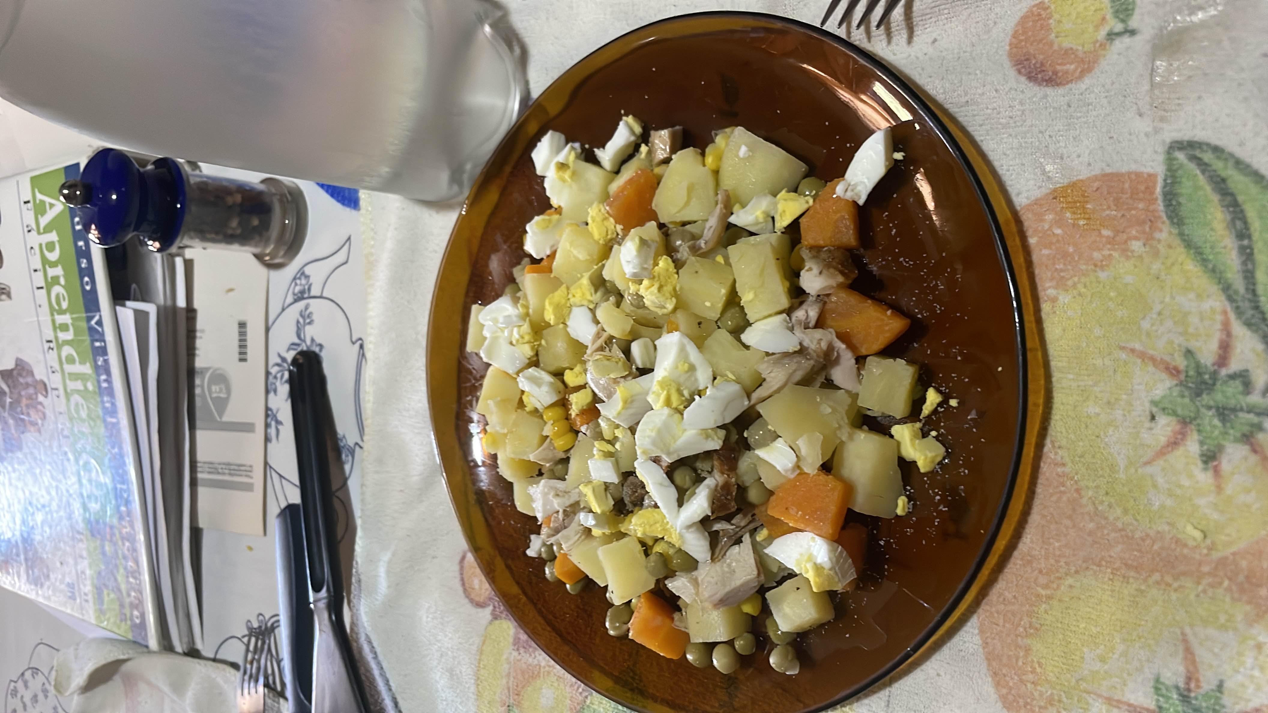 A balanced dish containing boiled potatoes, carrots, chicken, and eggs, providing a good mix of protein, carbs, and fats.