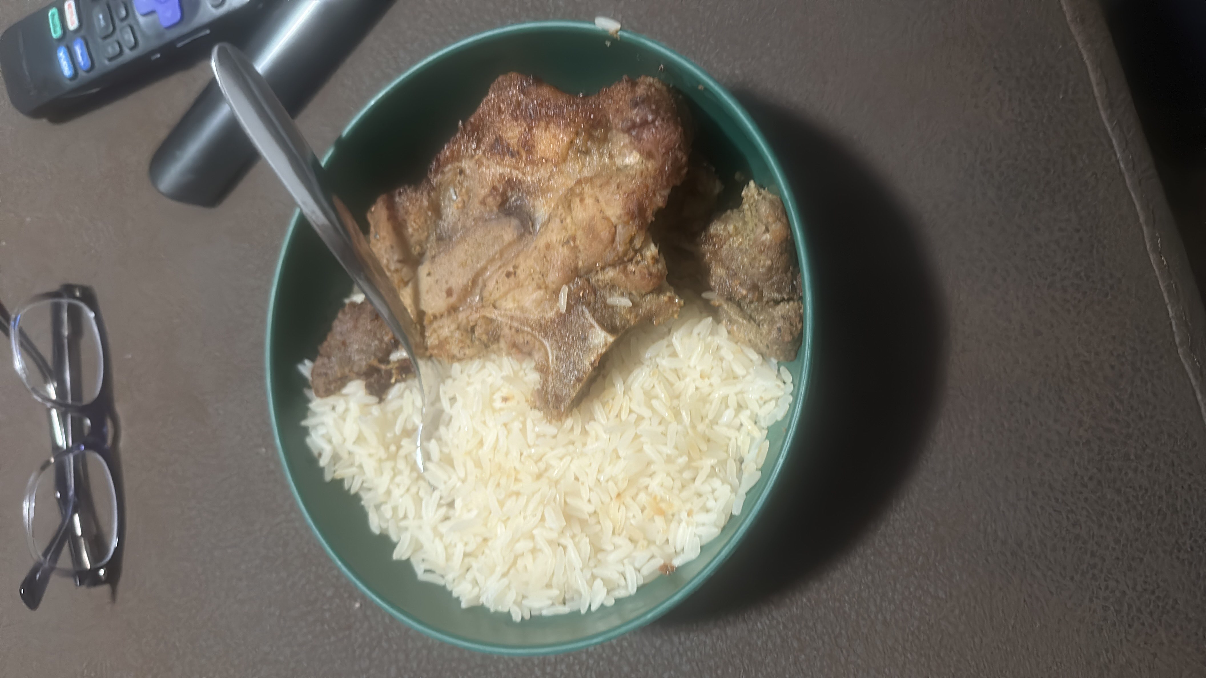 A meal consisting of white rice and grilled meat, providing a balanced mix of carbohydrates, protein, and fats.