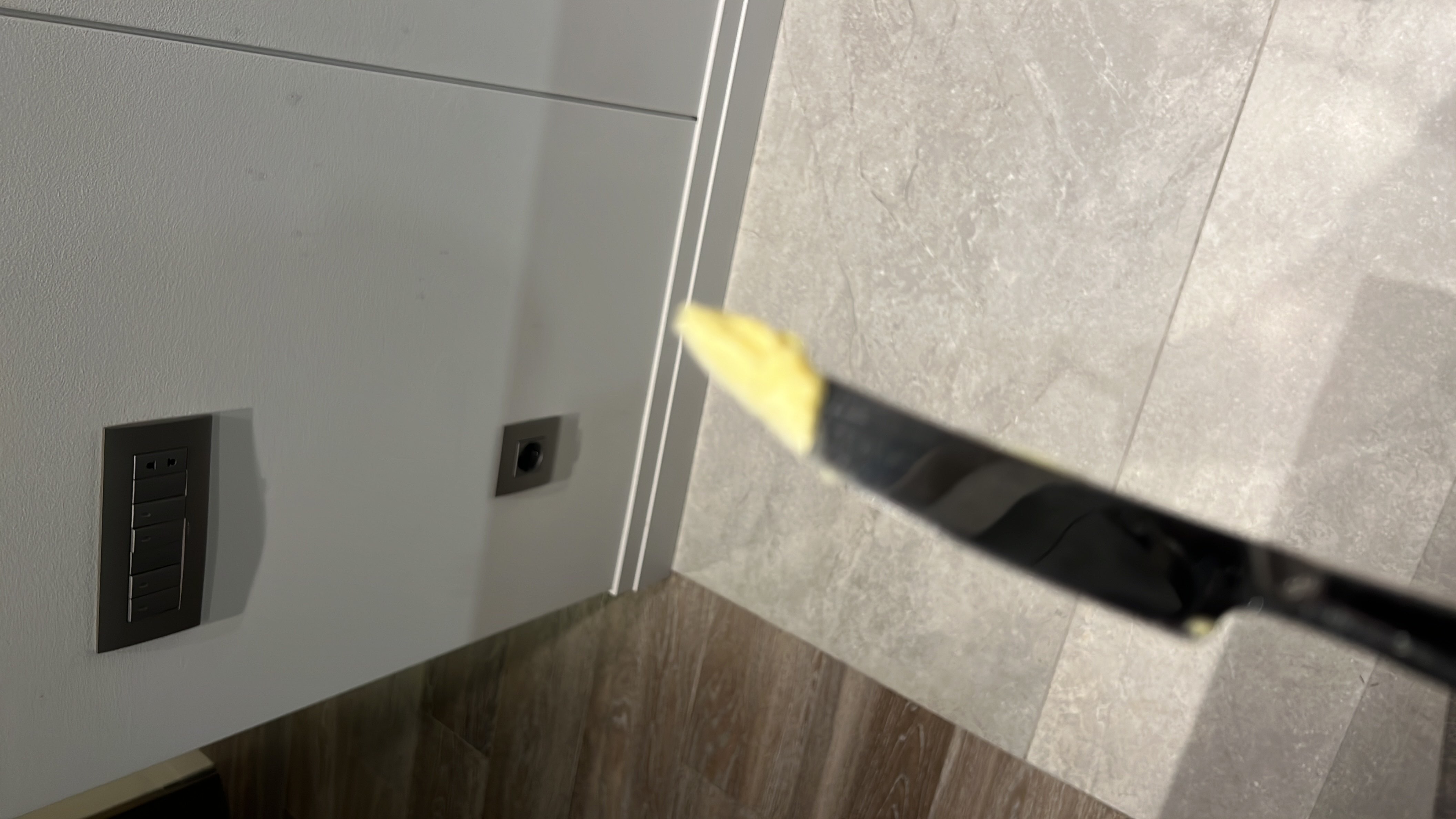 The image shows a small amount of butter on a knife, which is high in fats and calories but contains no protein or carbs.