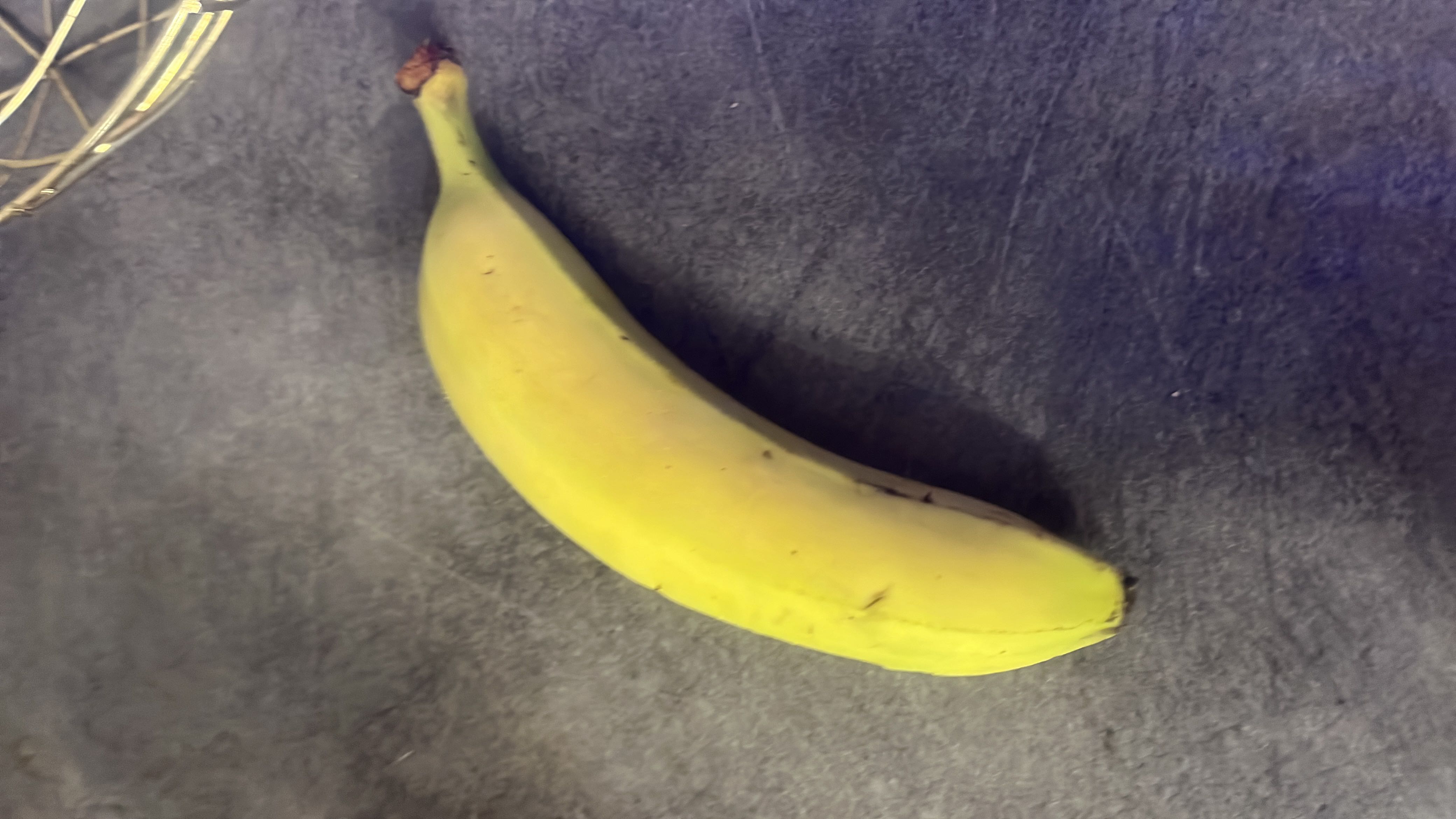 A banana is a nutritious fruit rich in carbohydrates, providing a good source of energy with minimal fats and moderate protein content.