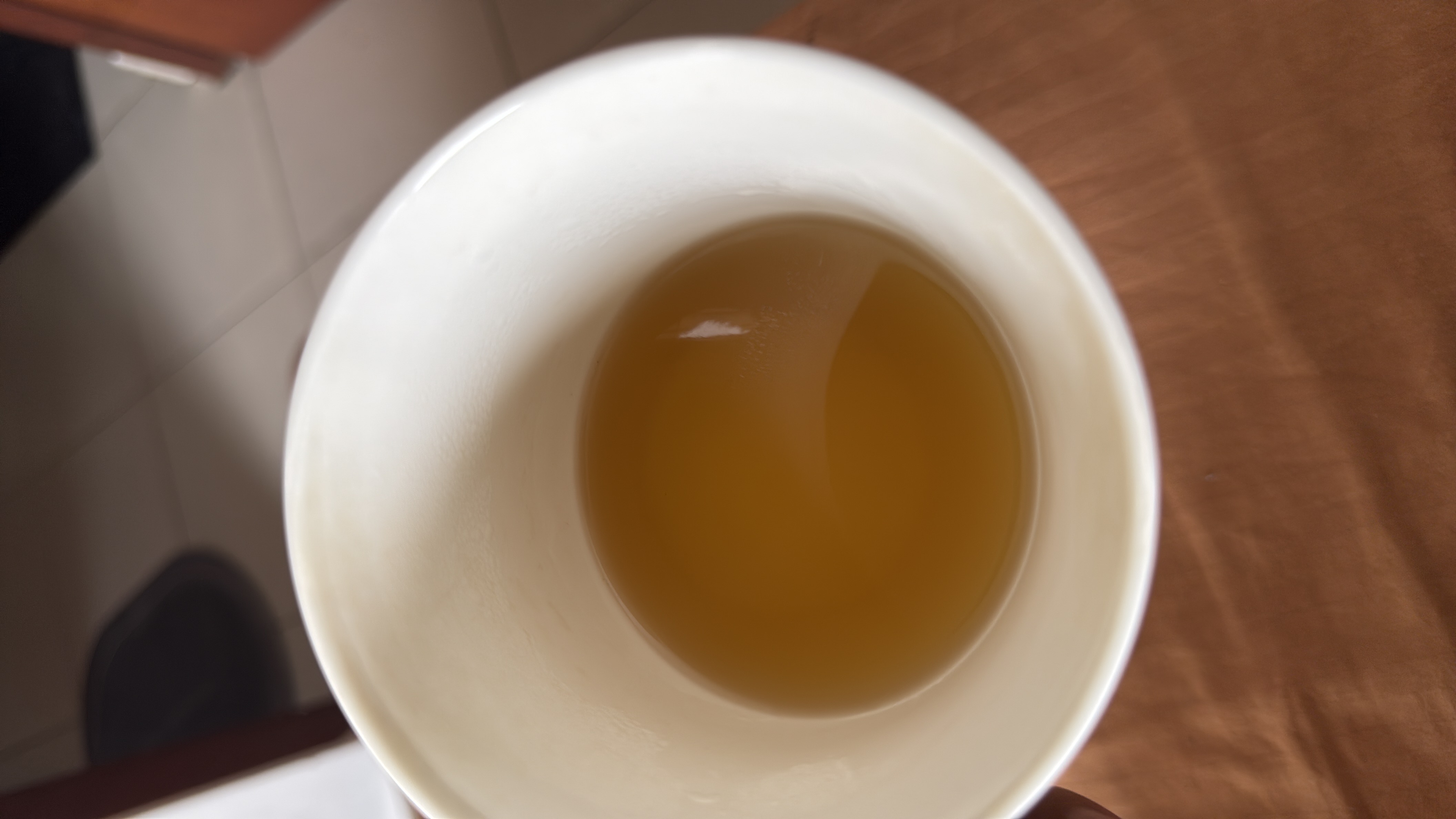 A cup of green tea, a low-calorie beverage rich in antioxidants and known for its health benefits.