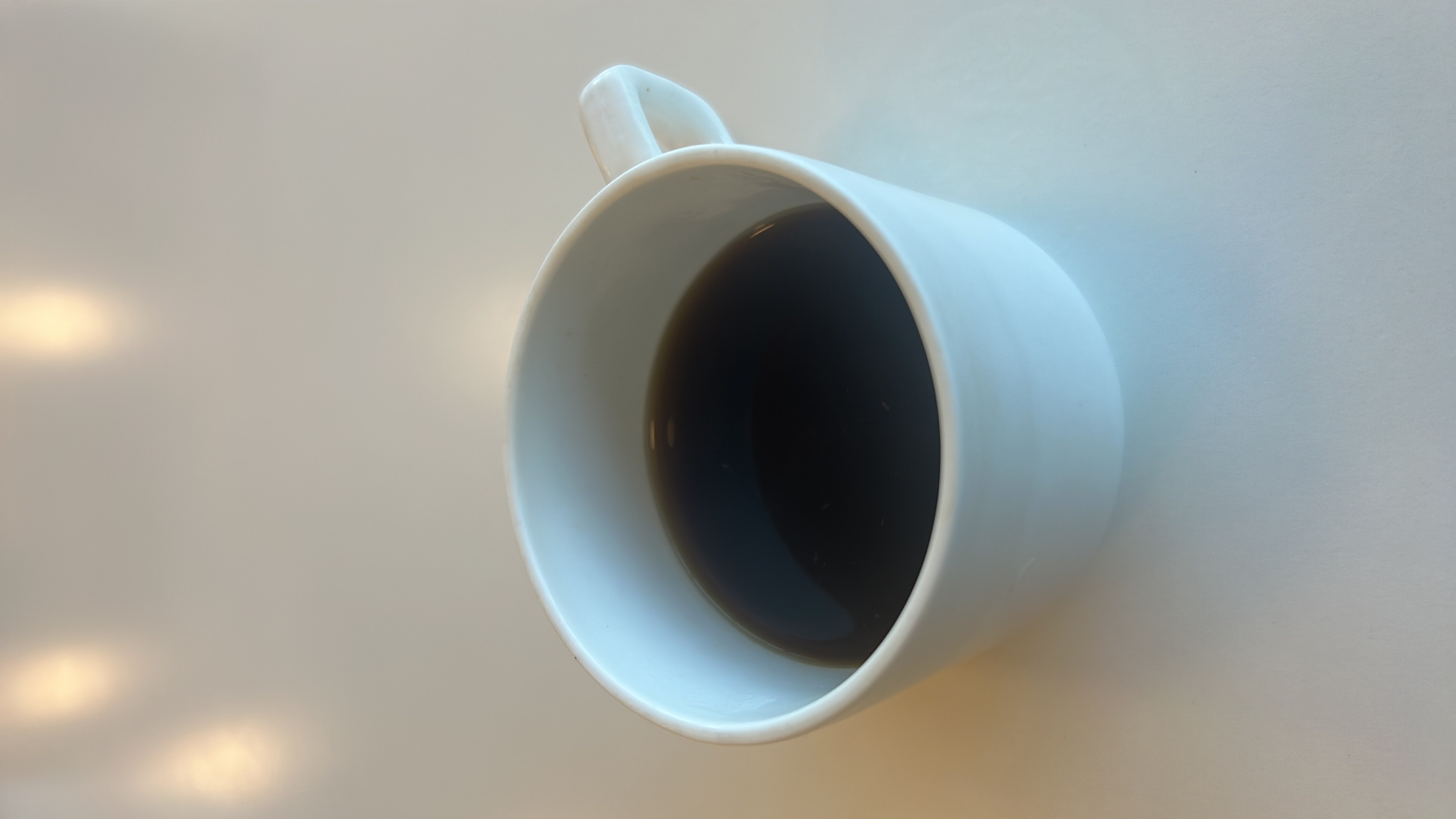 A cup of black coffee, which is low in calories and contains no fats or carbohydrates.