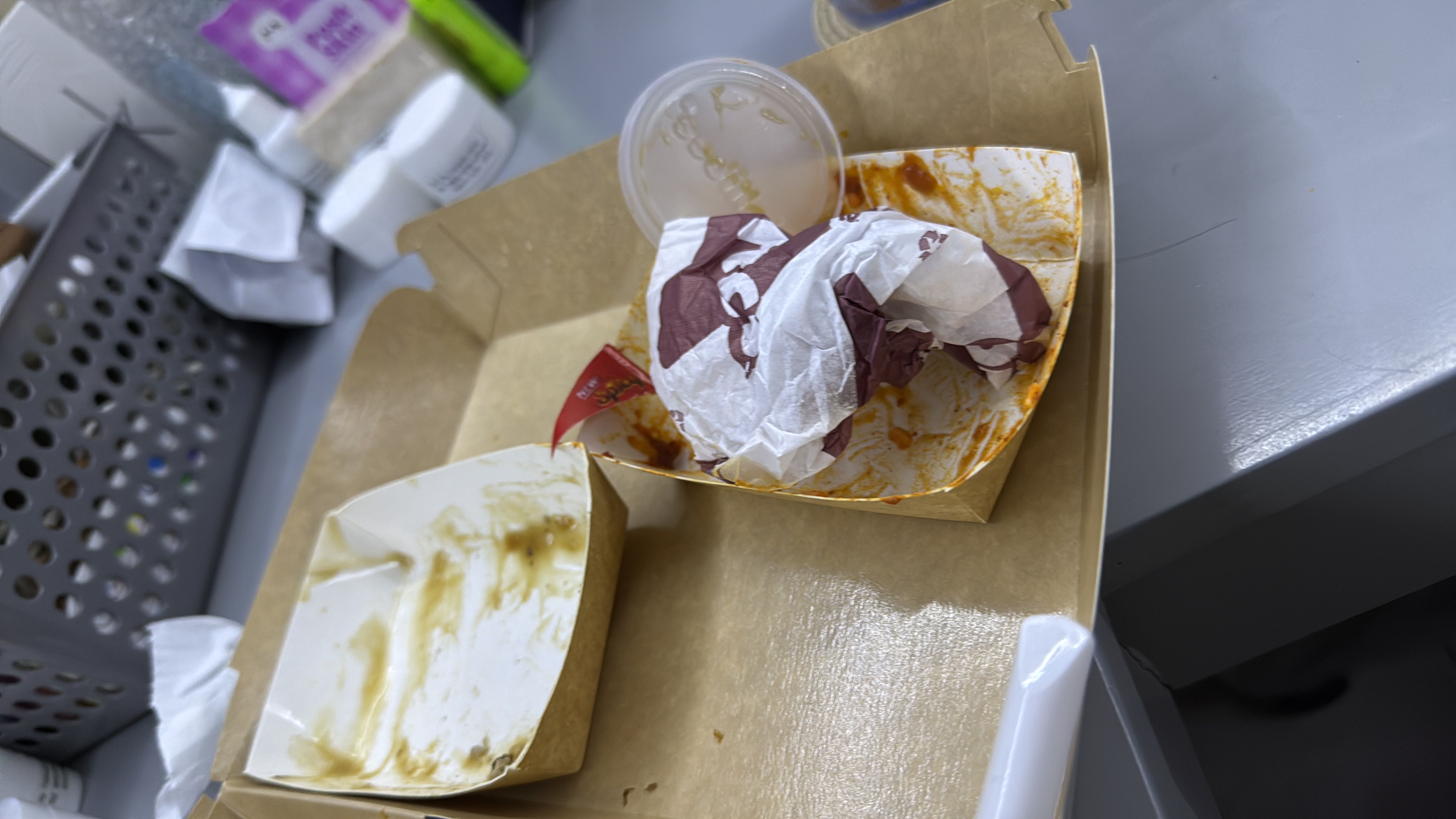 A tasty burger with cheese accompanied by crispy fries, providing a satisfying high-calorie meal with increased protein and fats.