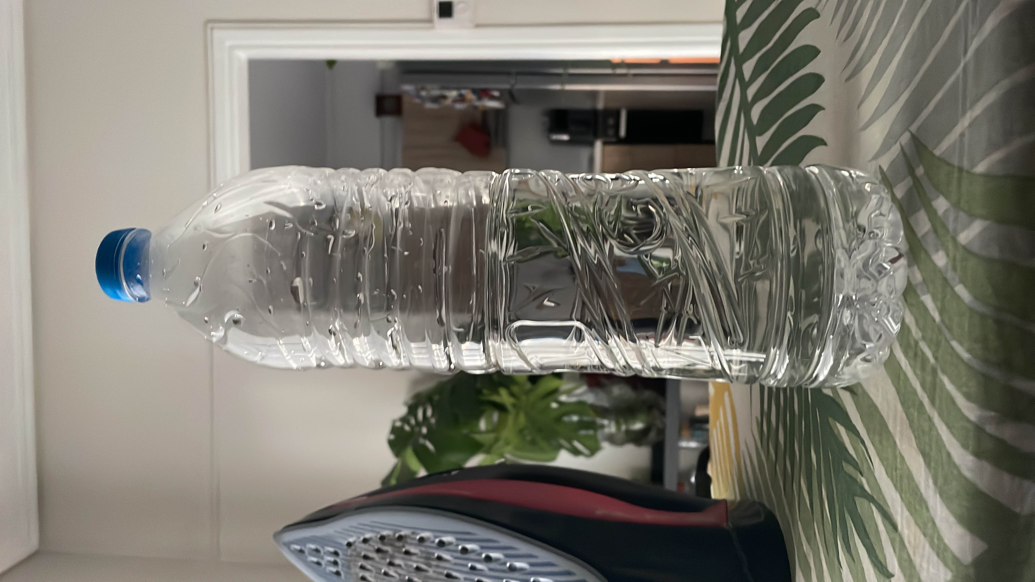 A bottle of water with no calories, fats, proteins, or carbohydrates, making it a highly healthy and hydrating choice.