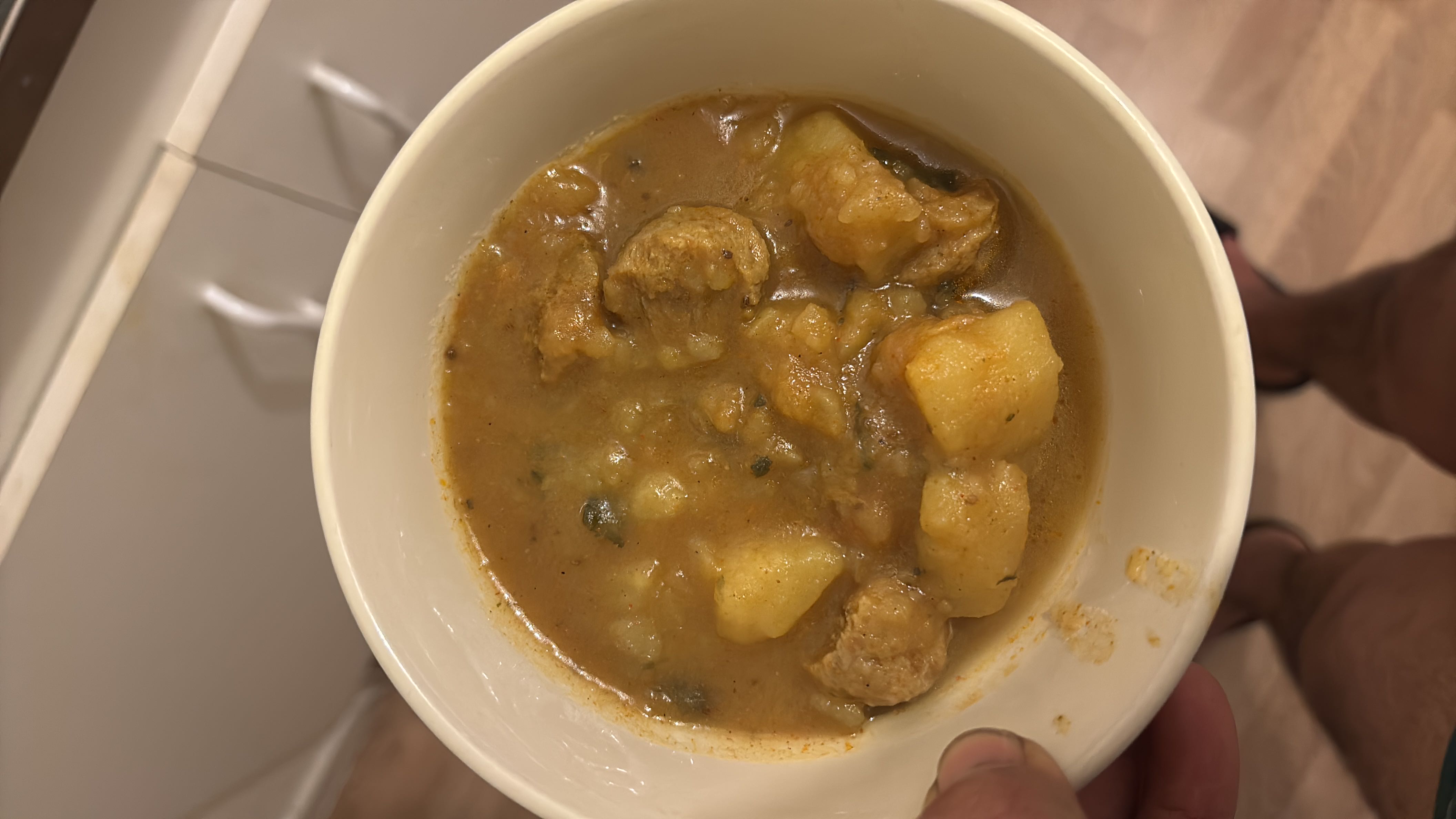 A hearty stew with potatoes, meat, and a flavorful gravy, providing a balanced mix of protein, carbs, and fats.