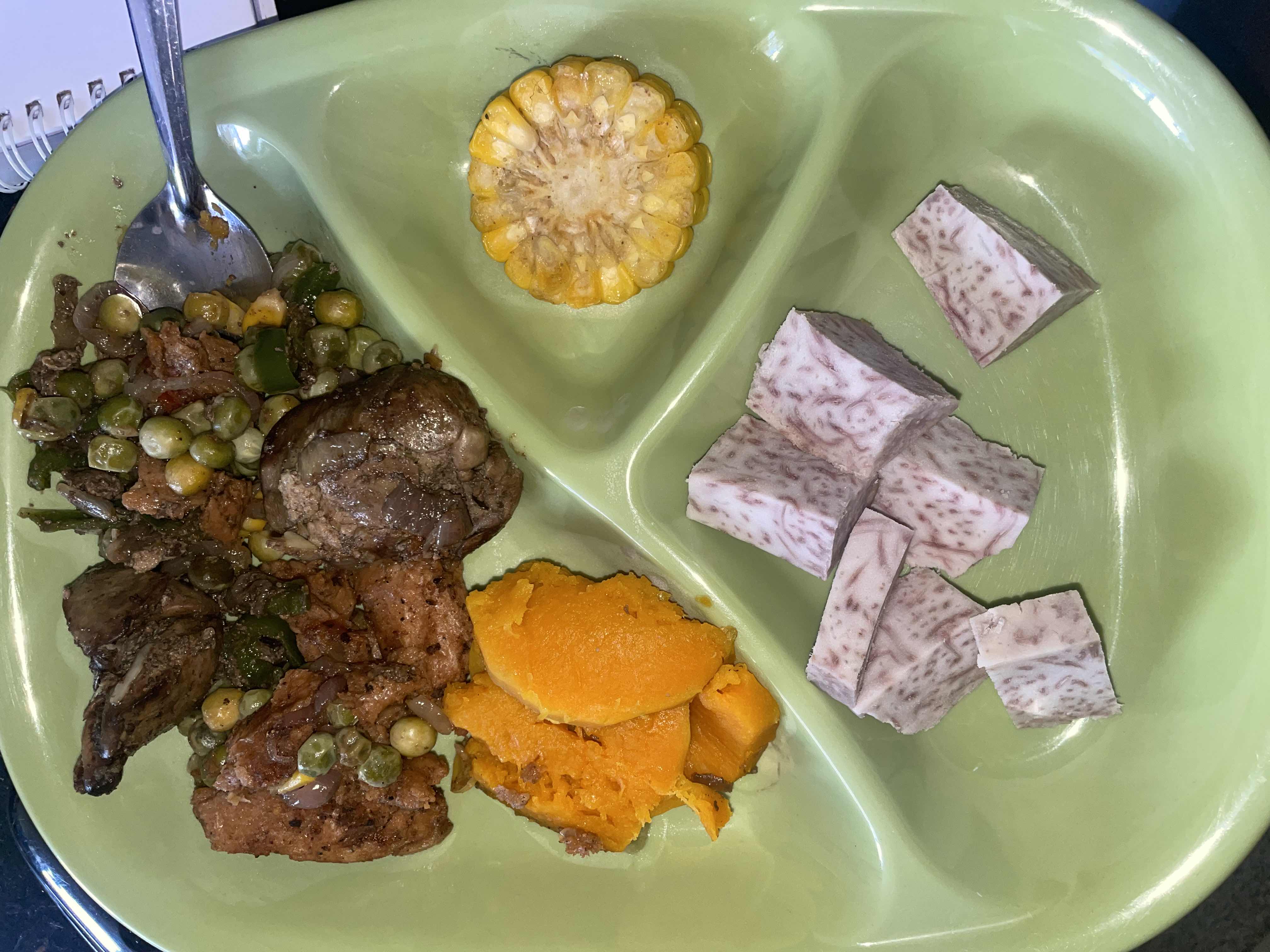 A balanced meal consisting of chicken liver, sweet potato, taro root, corn, and mixed vegetables, providing a good mix of protein, carbohydrates, and essential nutrients.