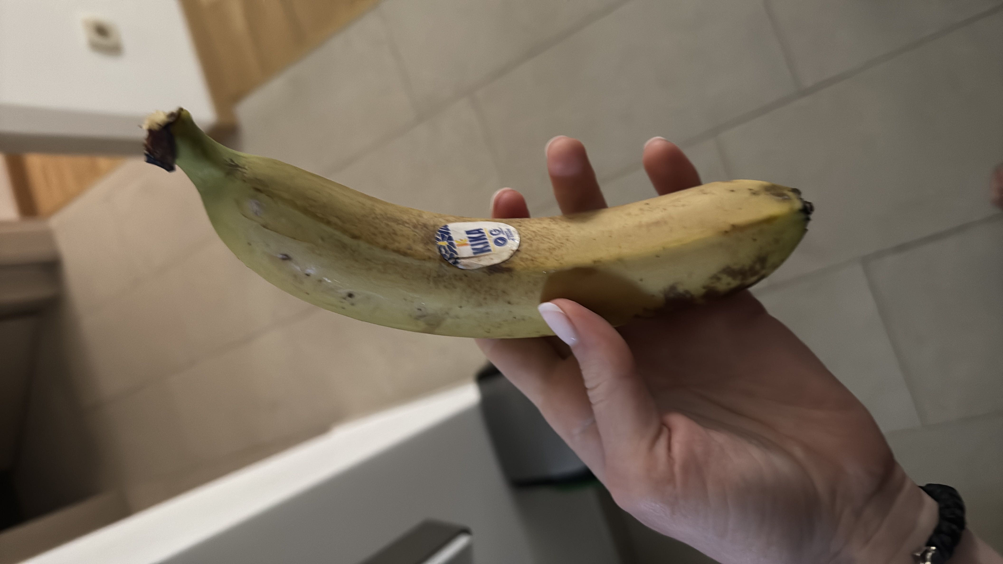 A ripe banana, a nutritious fruit rich in carbohydrates and essential vitamins, providing a quick energy boost.