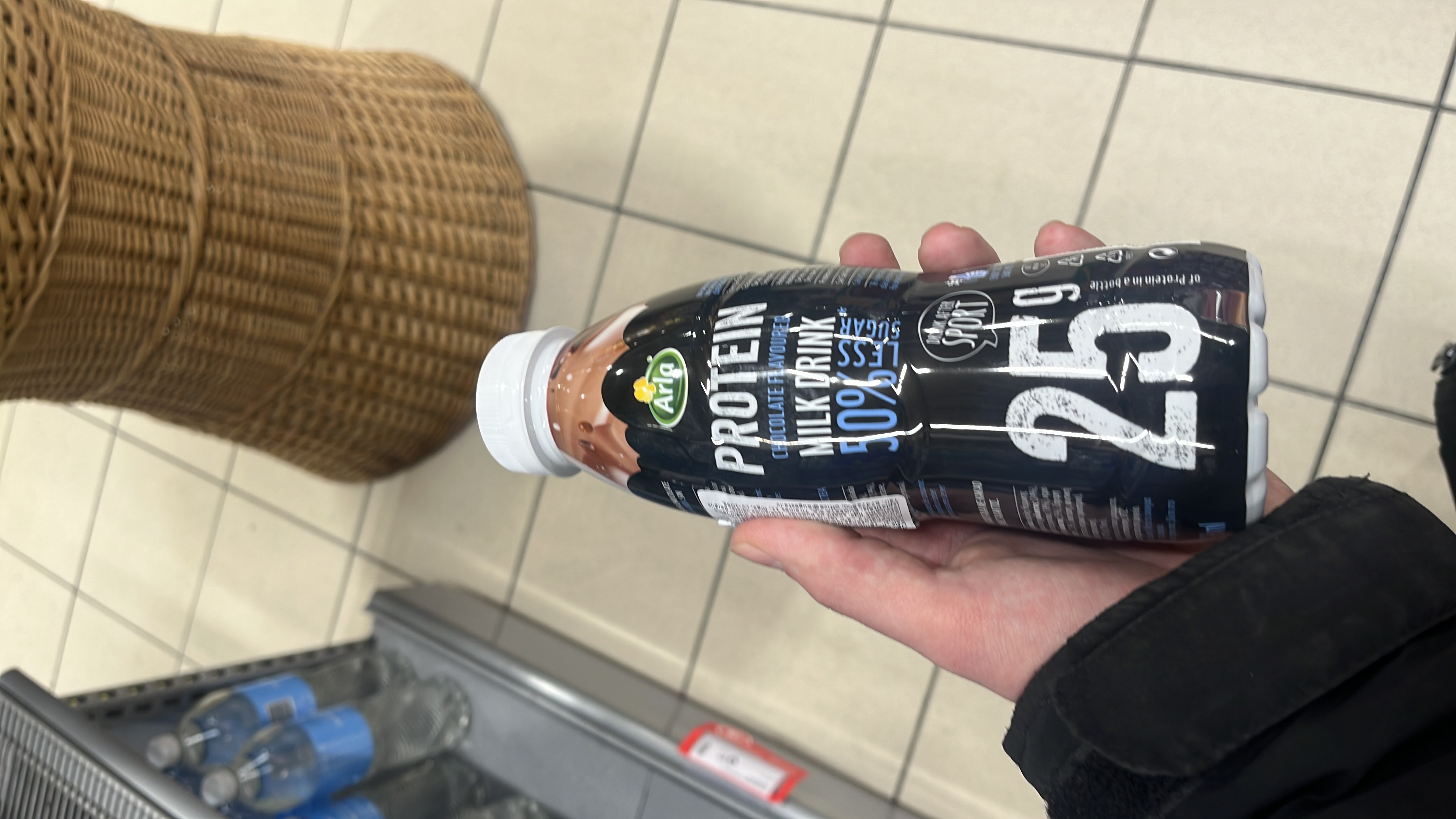 A high-protein chocolate-flavored milk drink with 50% less sugar, providing 25g of protein per bottle.