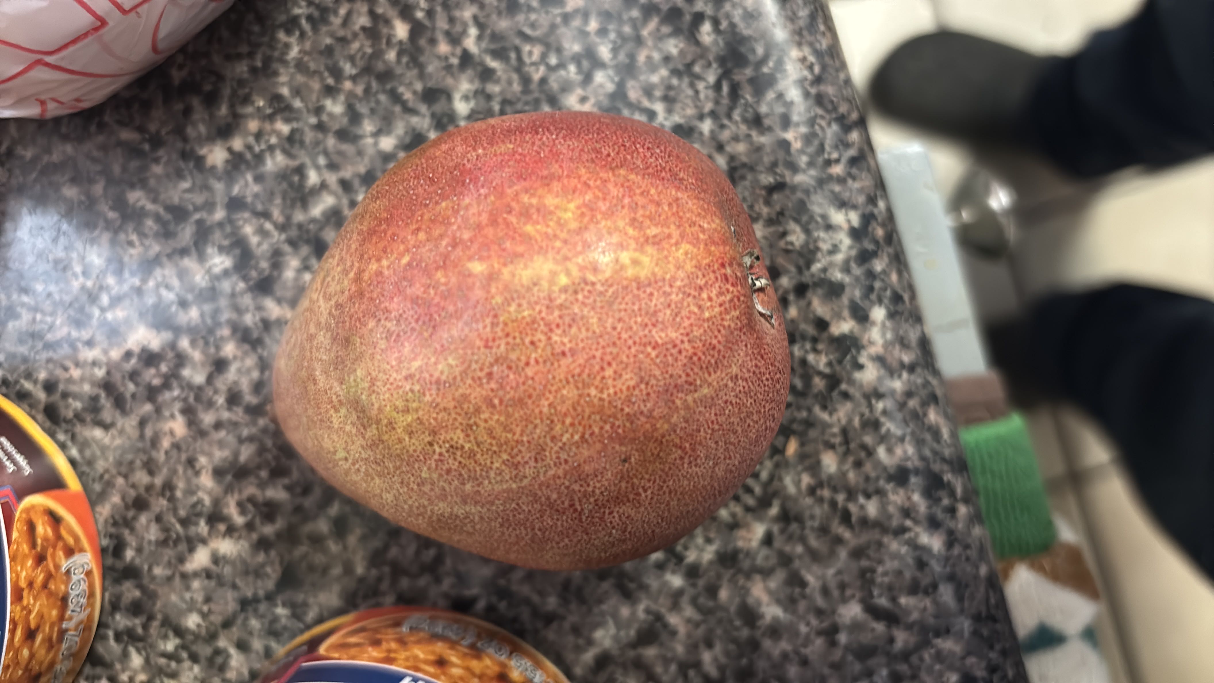 A ripe pear, rich in carbohydrates and fiber, providing a healthy and natural source of energy.