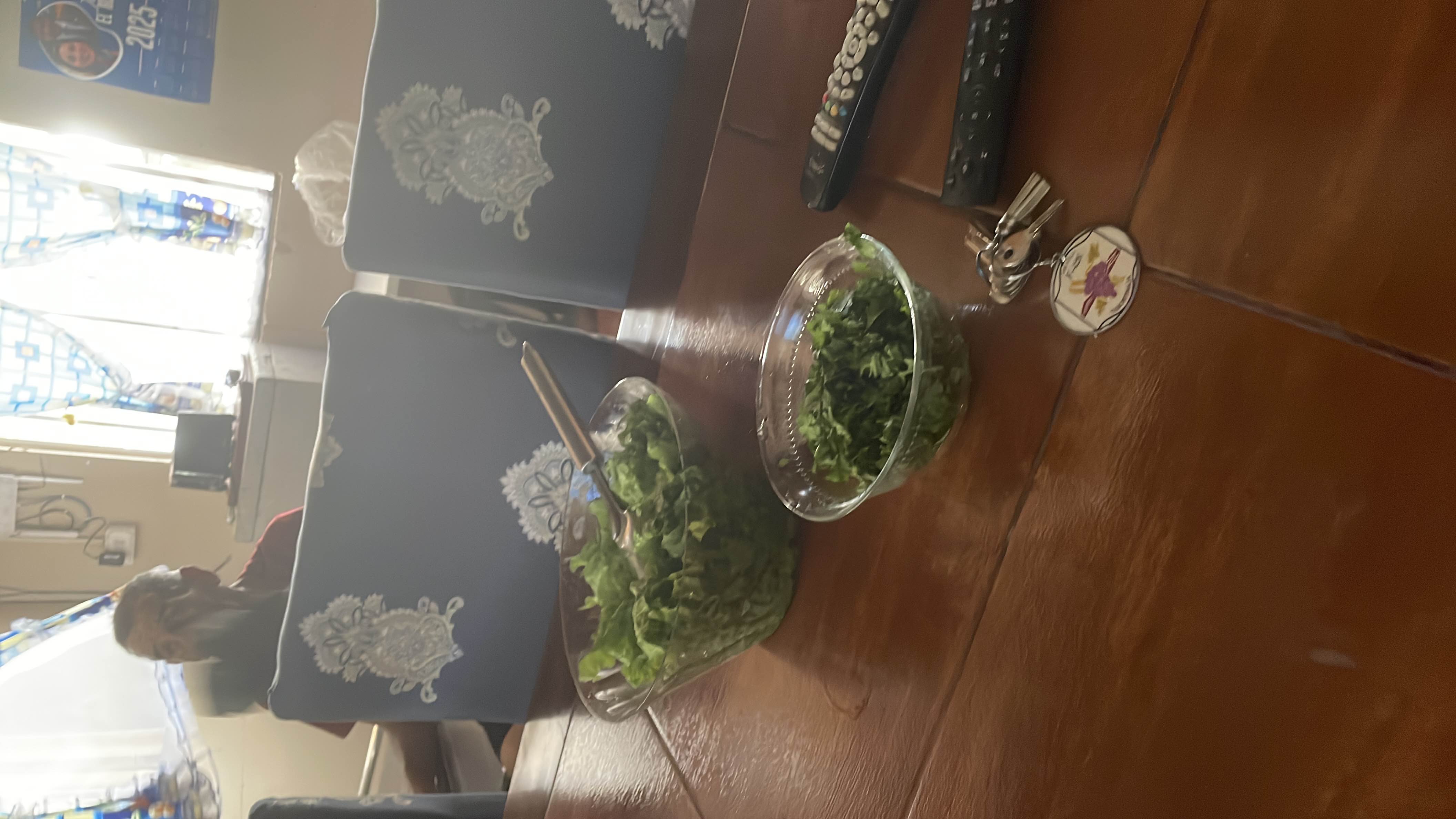 A fresh salad consisting of lettuce and cilantro, providing a low-calorie and nutrient-rich meal option.