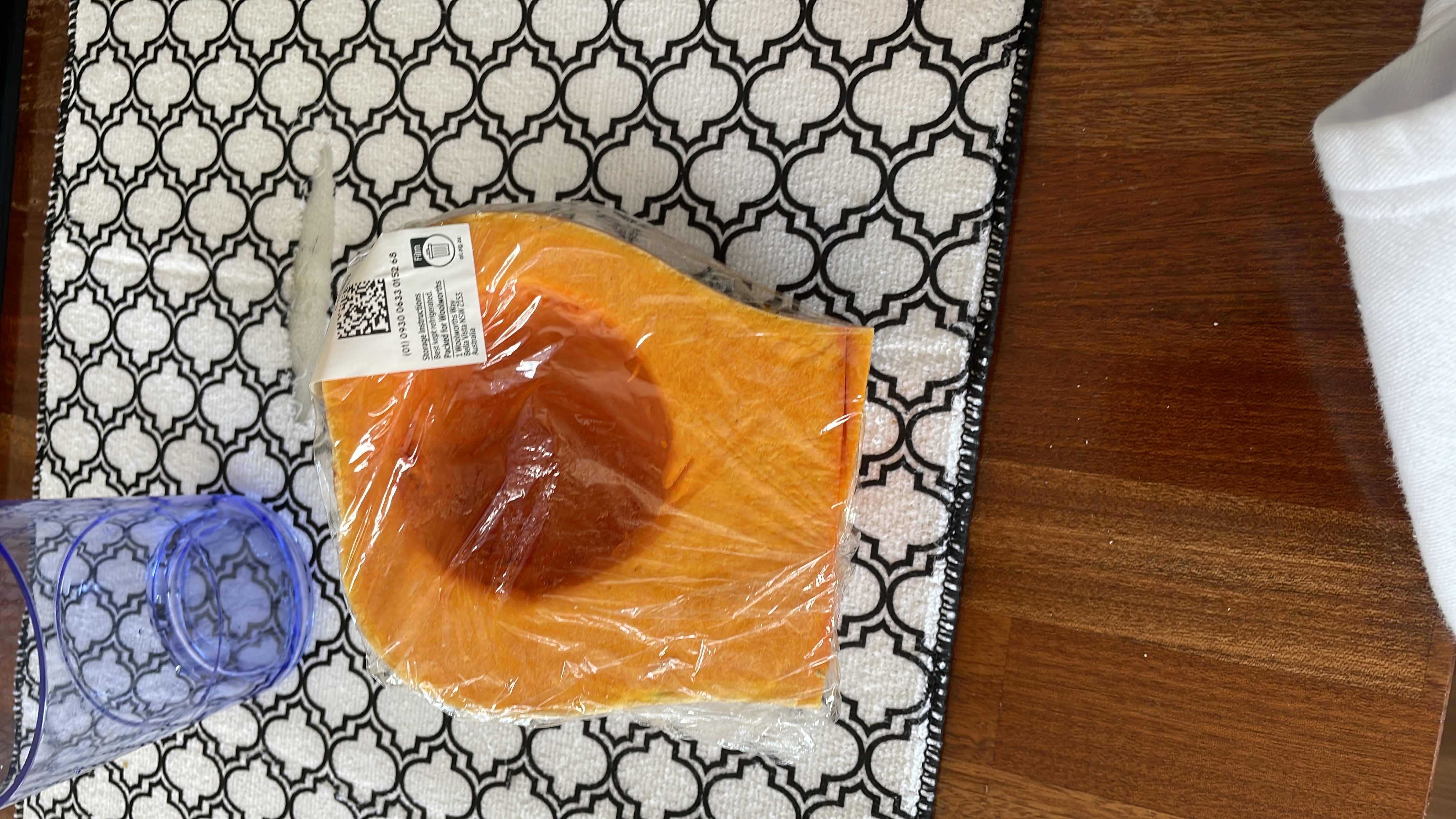 A fresh cut of pumpkin, rich in fiber and low in calories, making it a nutritious choice.