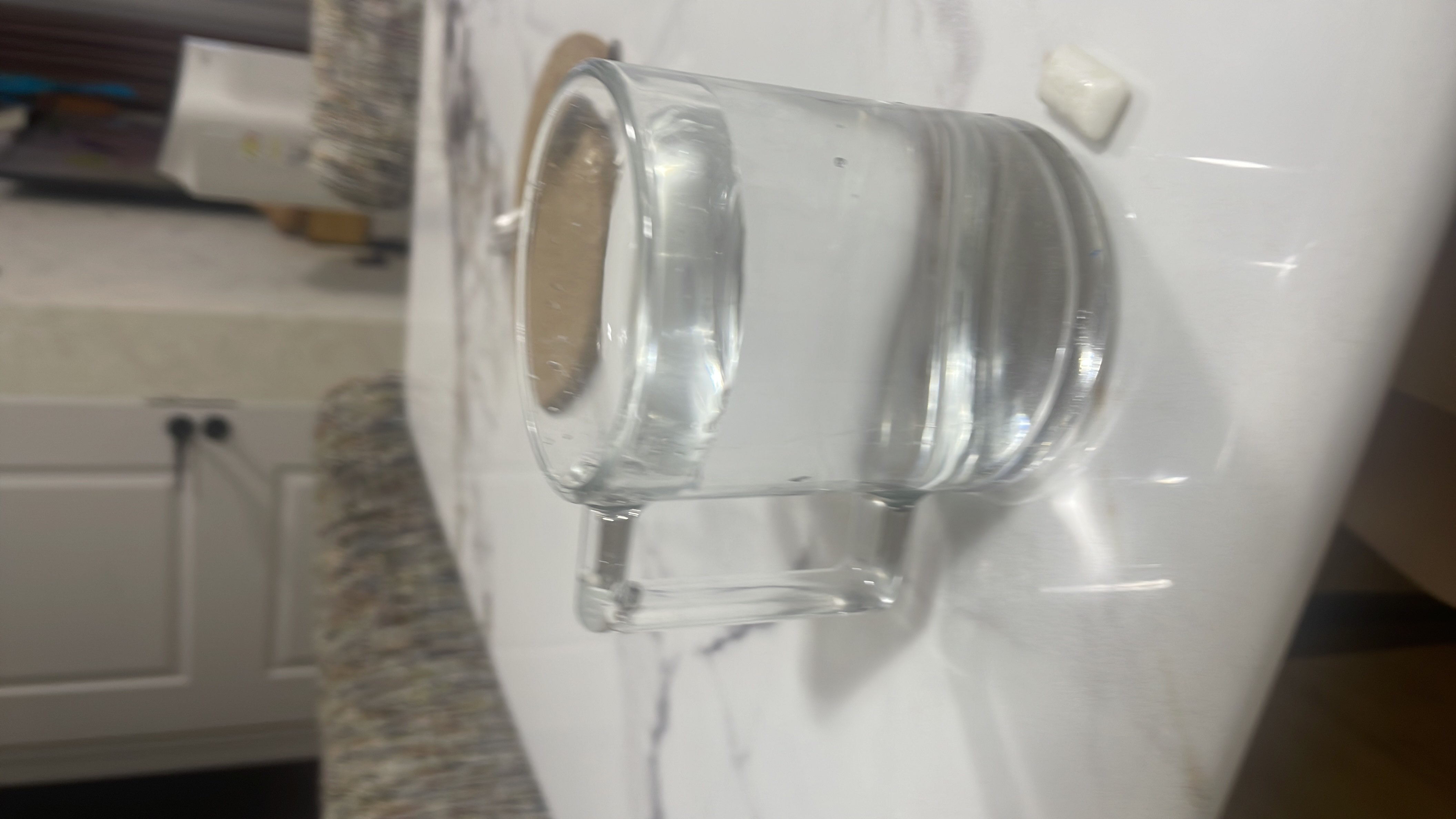 A glass of water with no significant nutritional content.