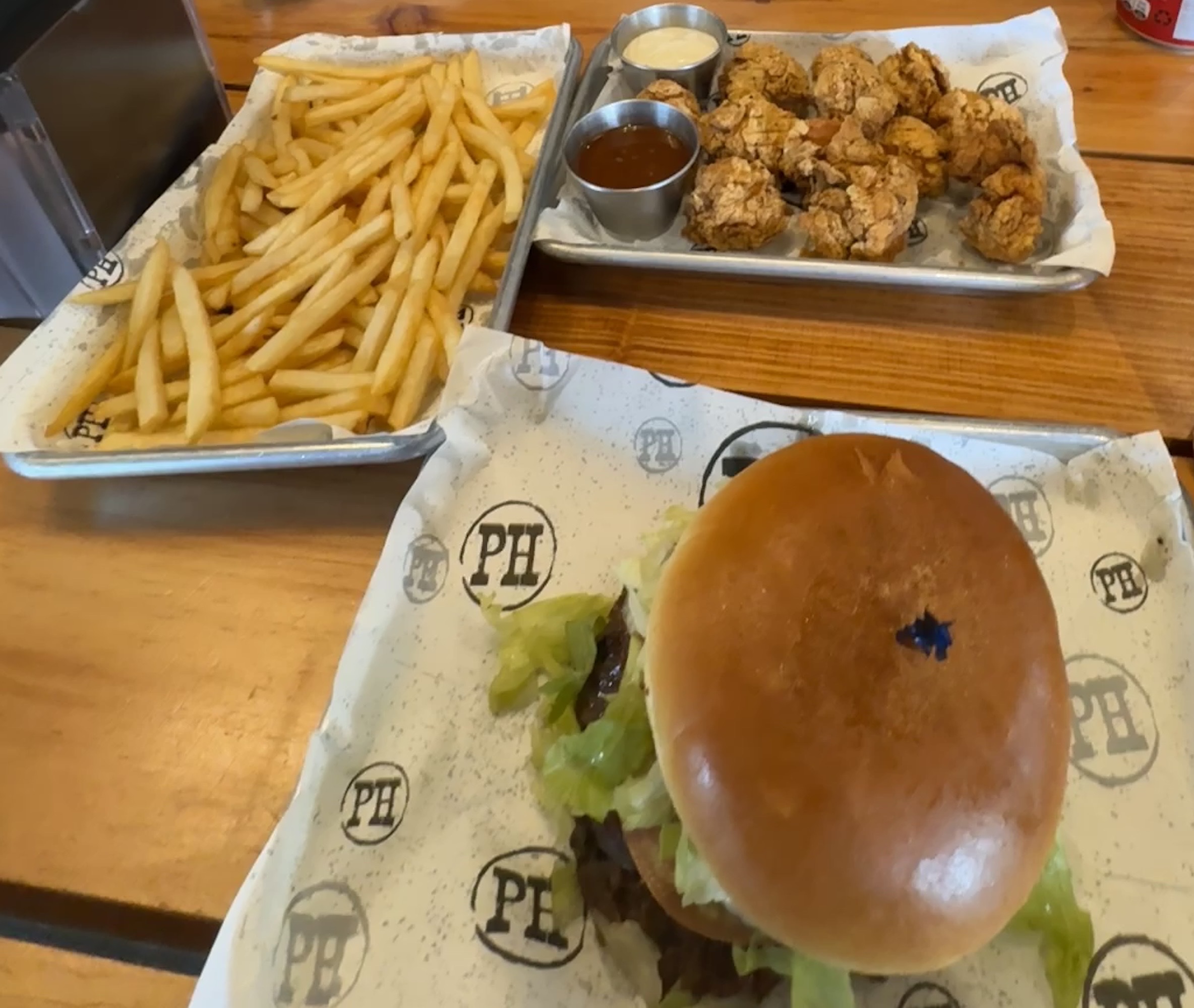 Burger with fries and nuggets