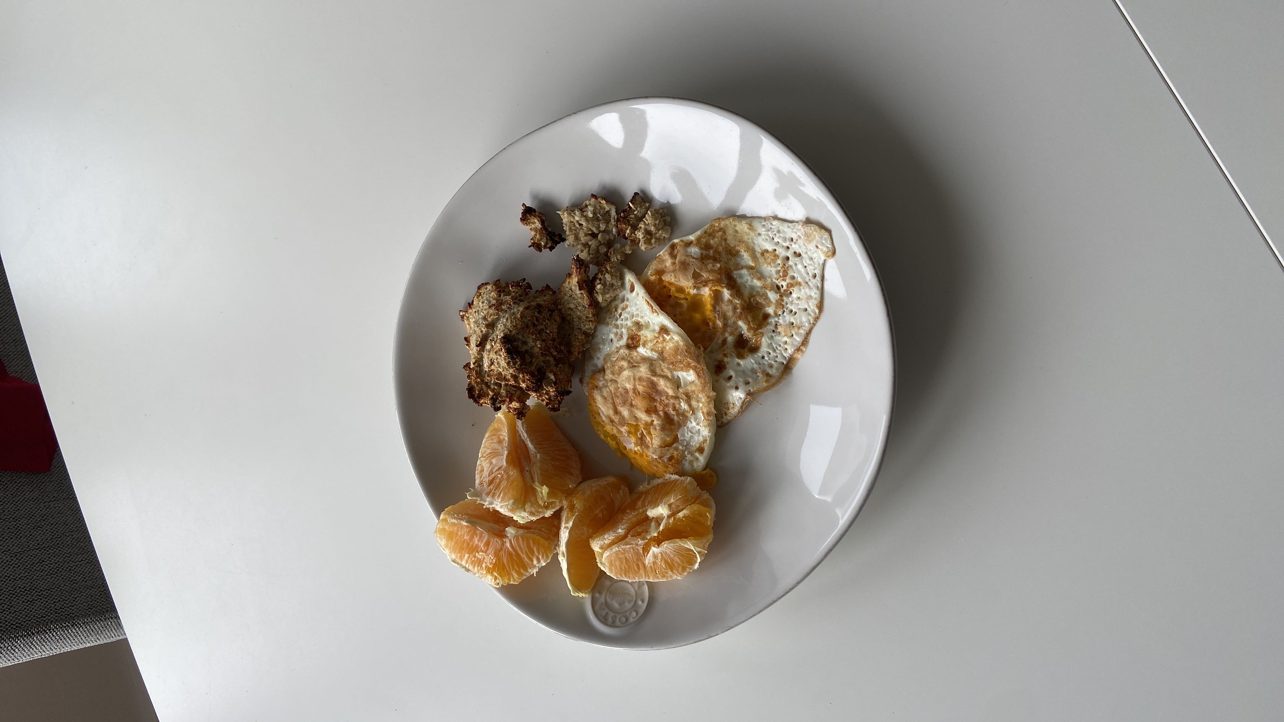 Eggs with fruit and biscuit