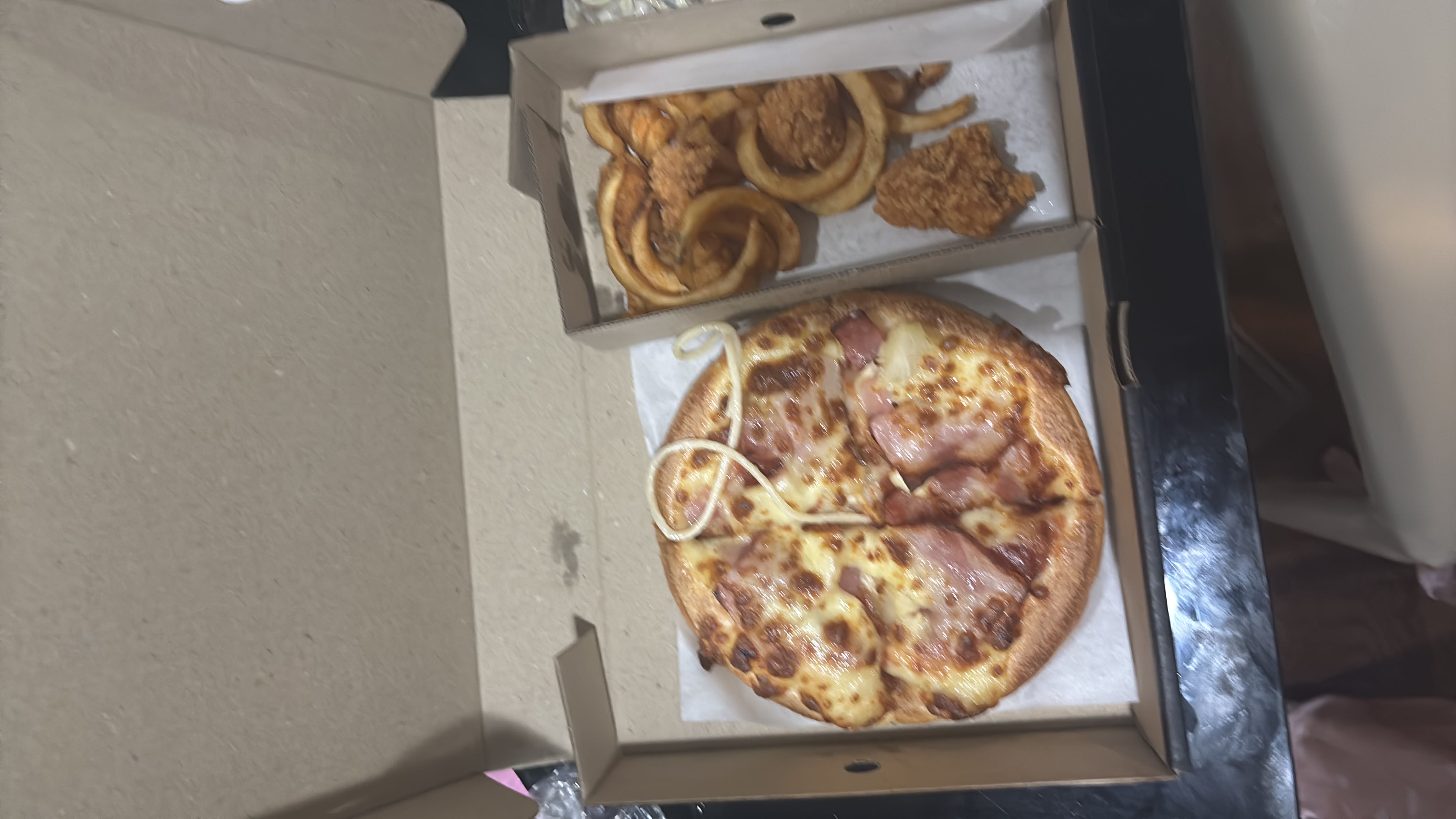 Pizza with fried sides