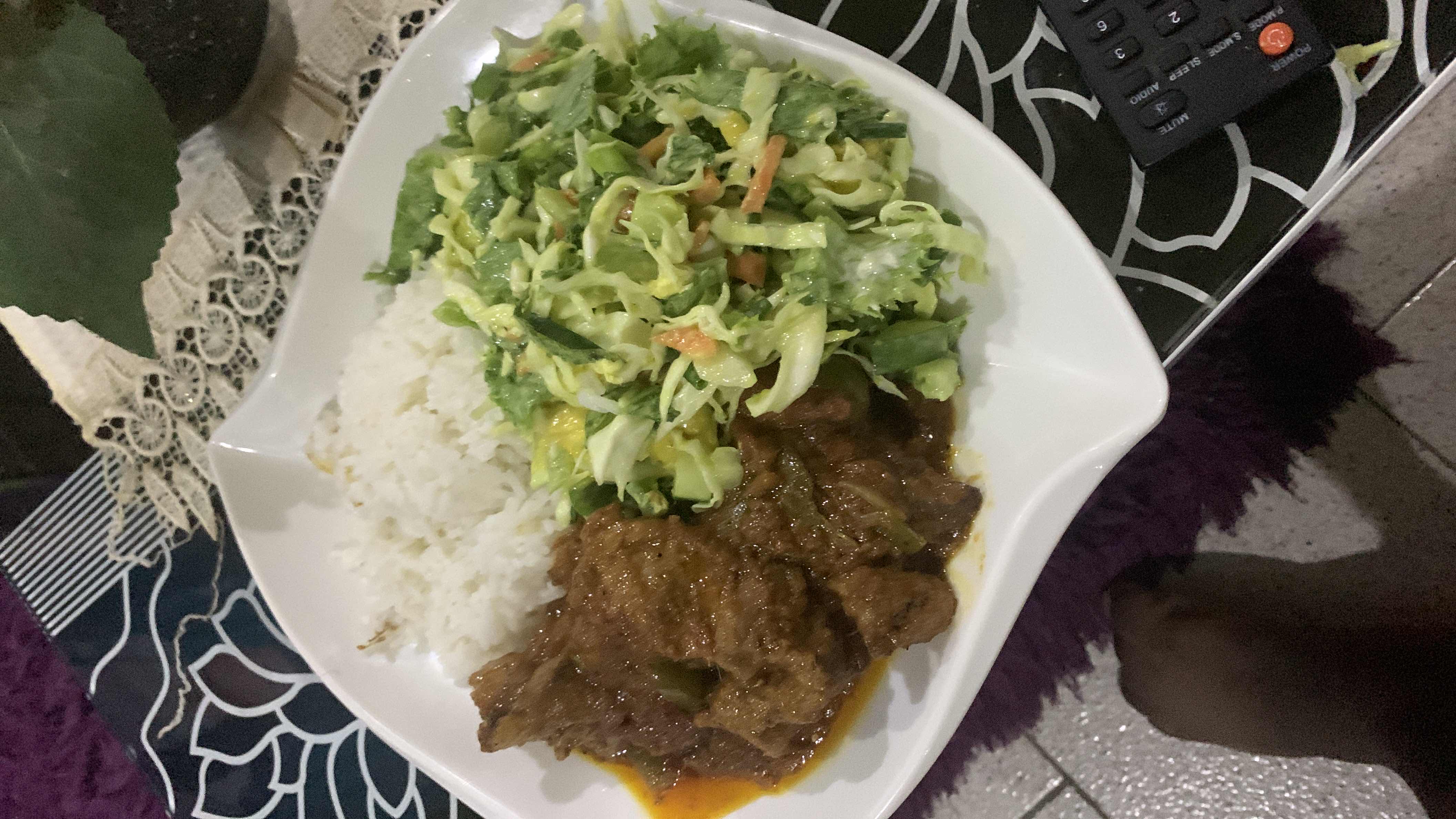 Rice with beef and salad