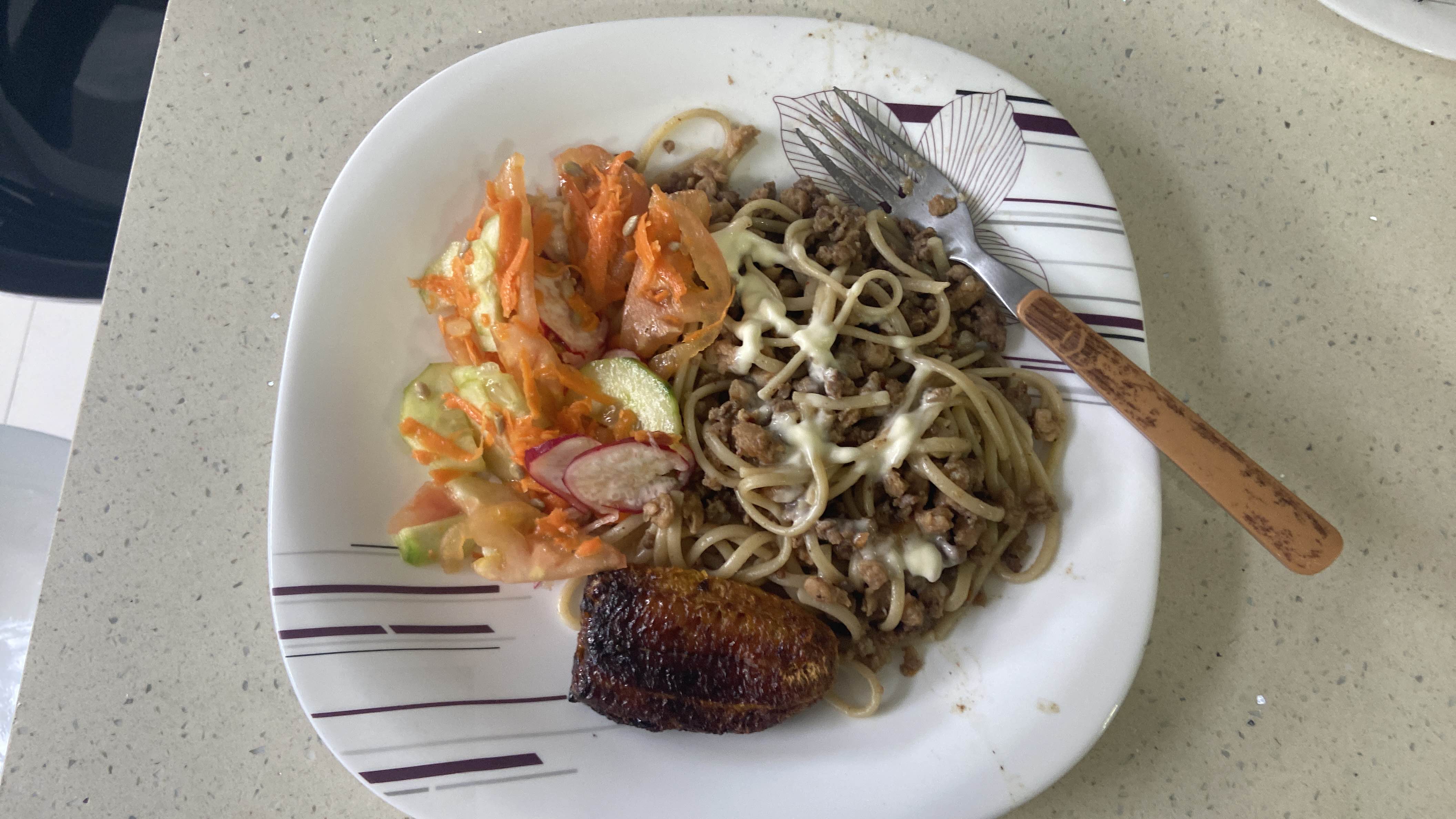 Pasta with salad and plantain
