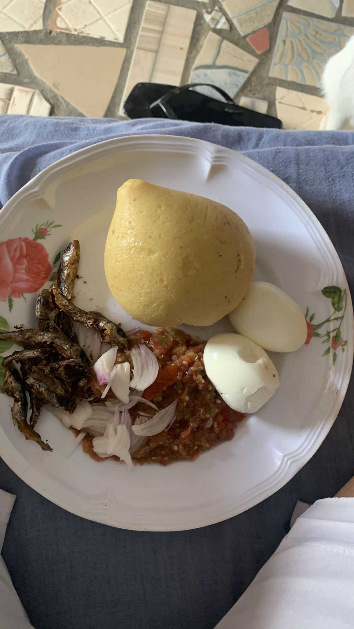 Eba with eggs and fish