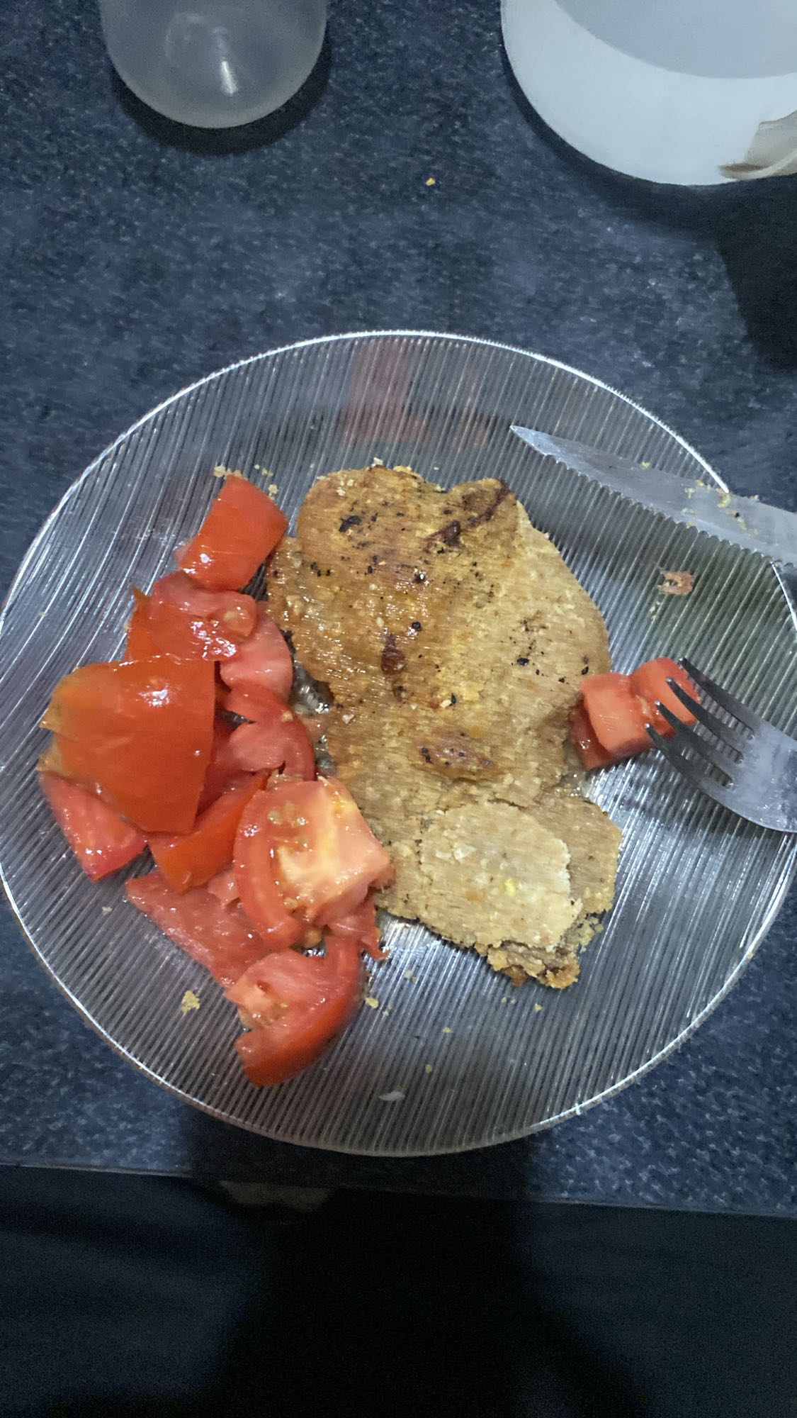 Milanesa con tomate