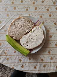 Bread with spread and cucumber