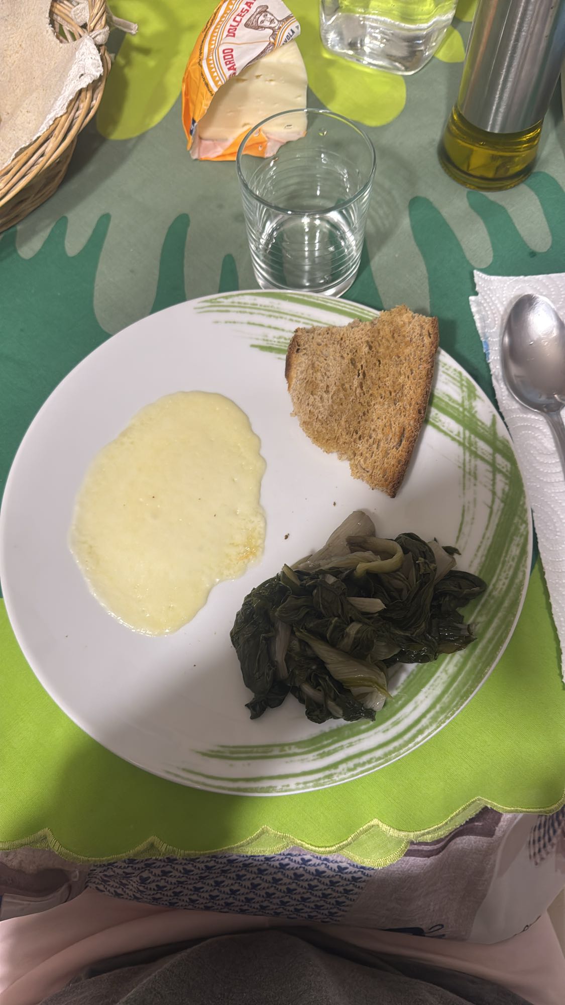 Melted cheese with greens