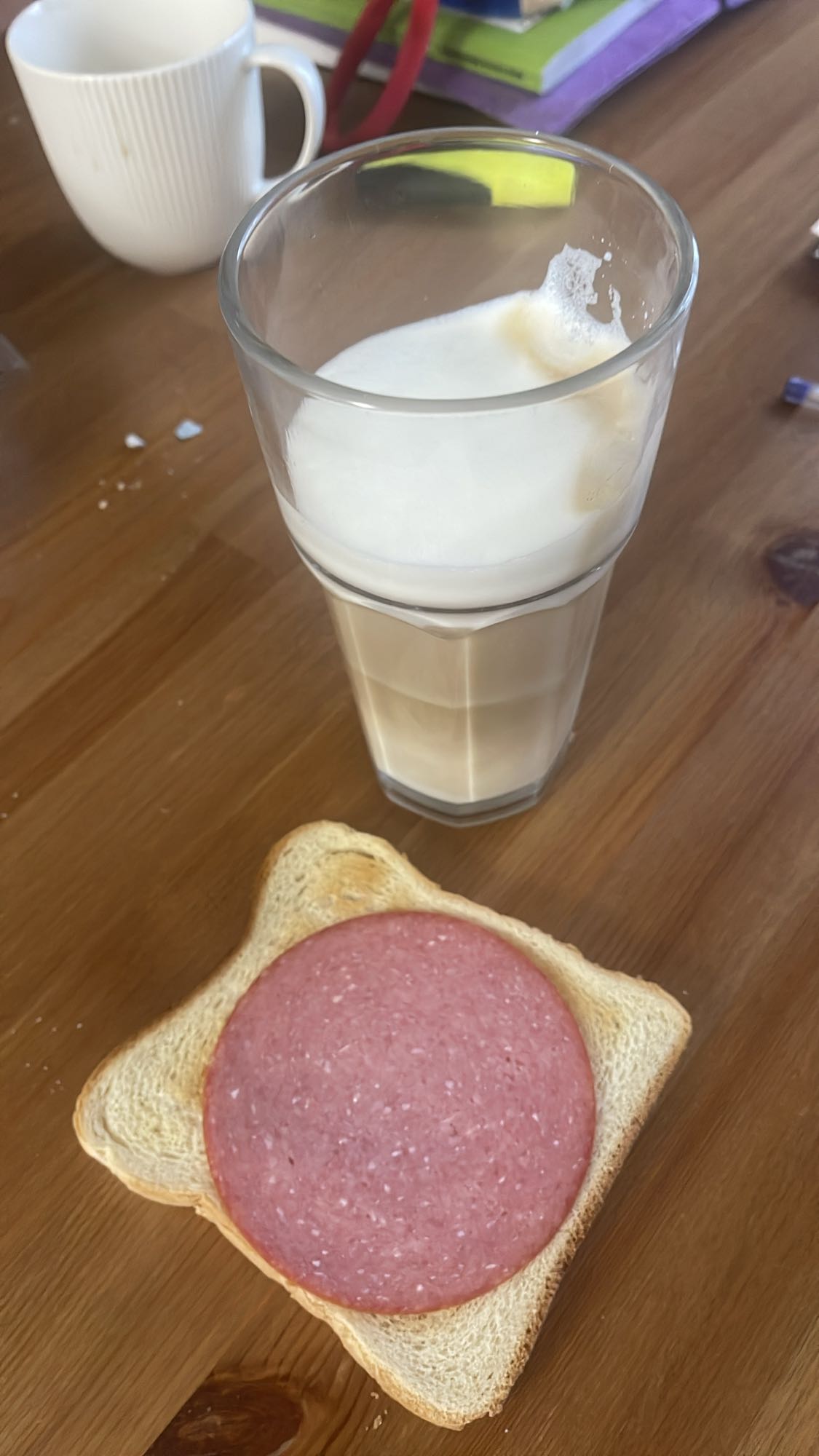 Toast with salami and latte