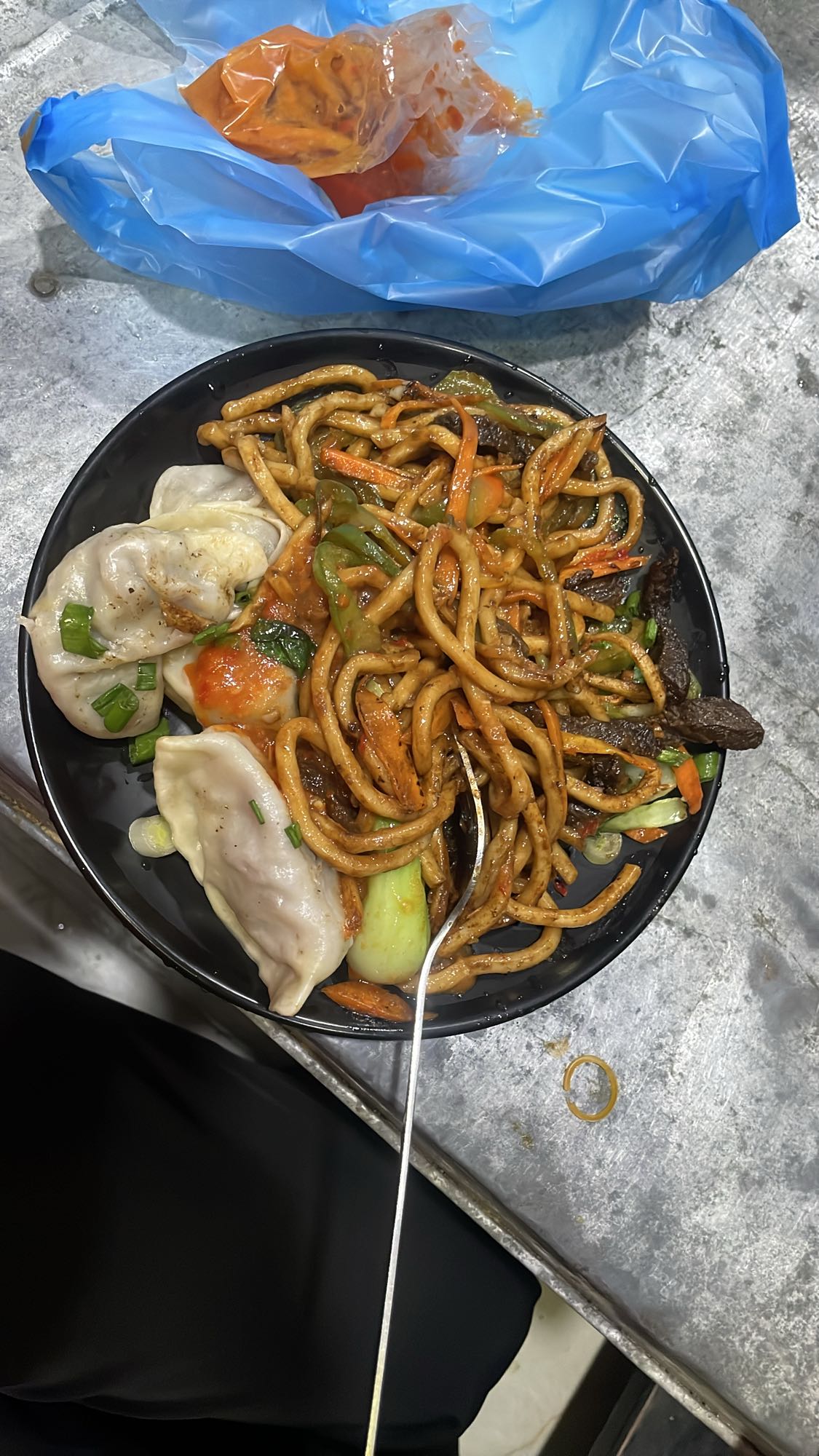 Spicy Noodles with Dumplings