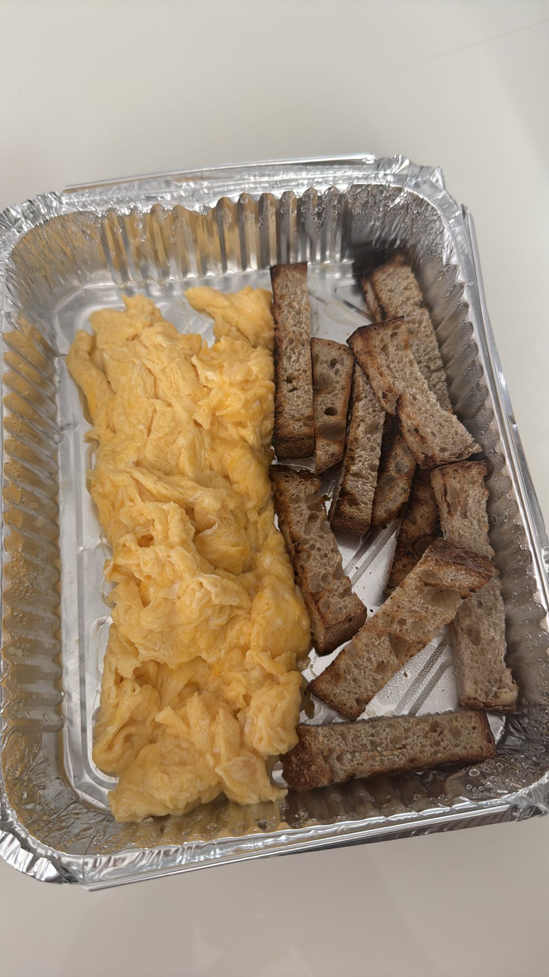 Scrambled eggs and toast